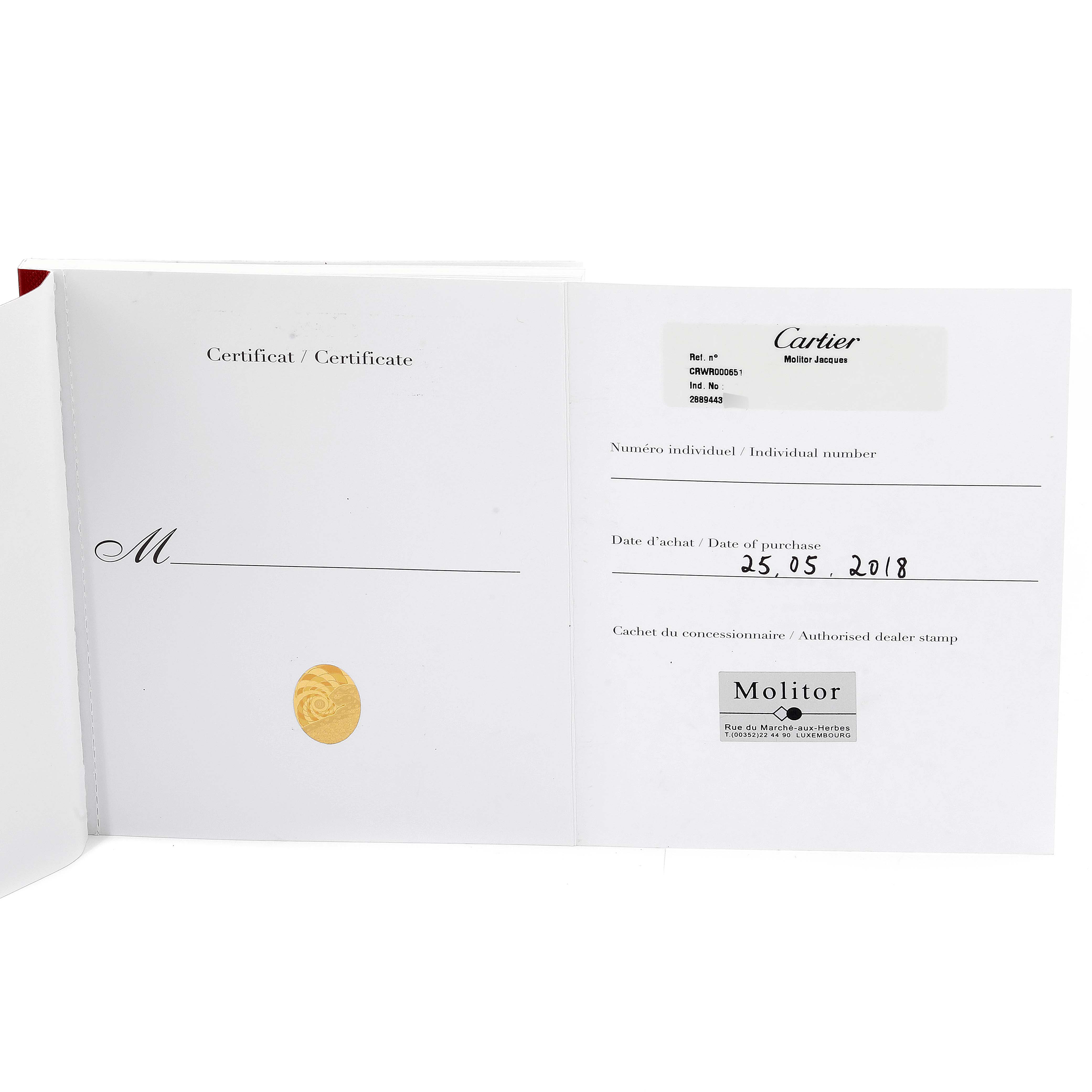 This image shows a warranty certificate booklet for the Ronde model by Cartier, including date of purchase and dealer stamp details.