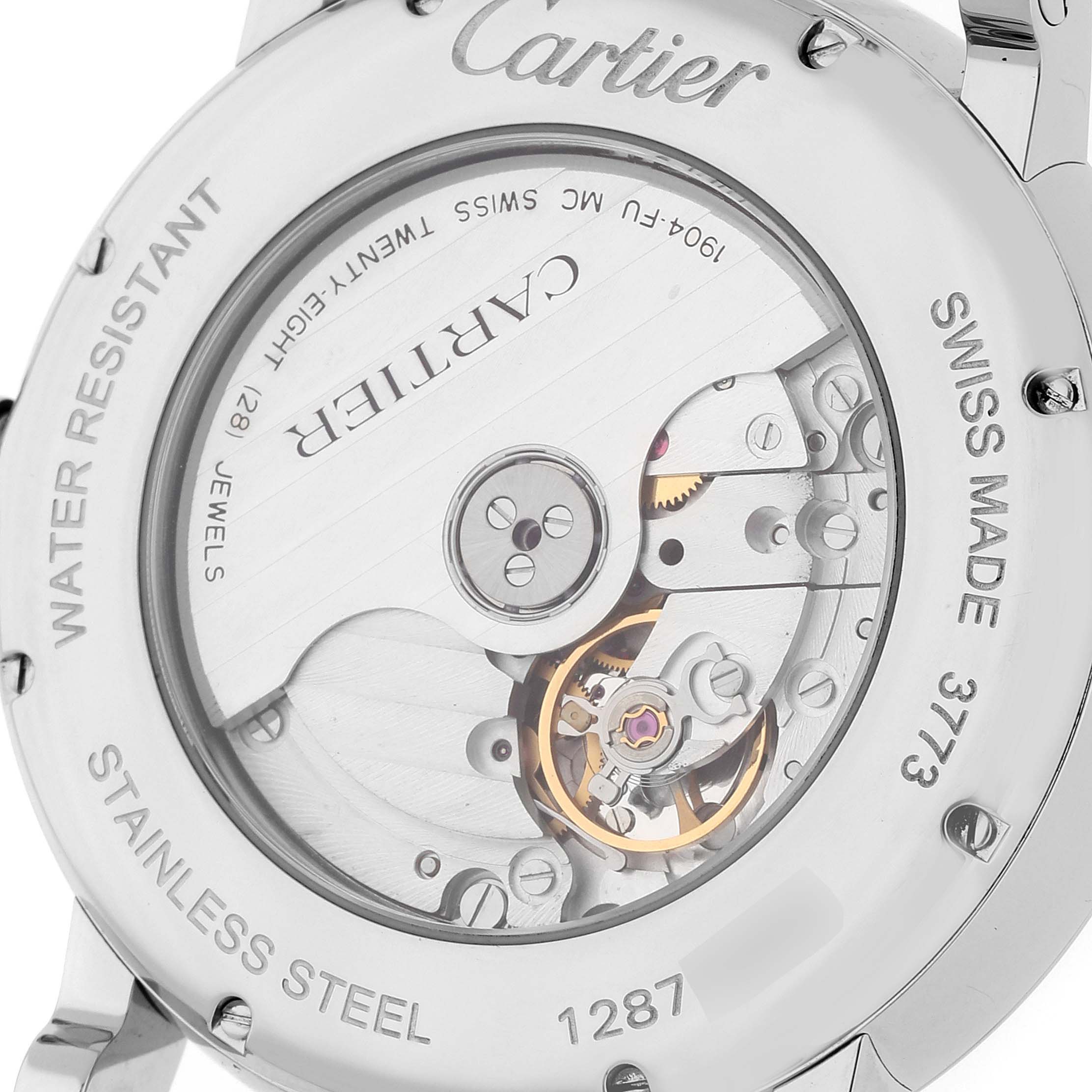 This image shows the case back of a Cartier Rotonde W1556368 Men
s Stainless Steel Silver Dial W1556368 Men
s Stainless Steel Silver Dial watch, revealing the movement and inscriptions.