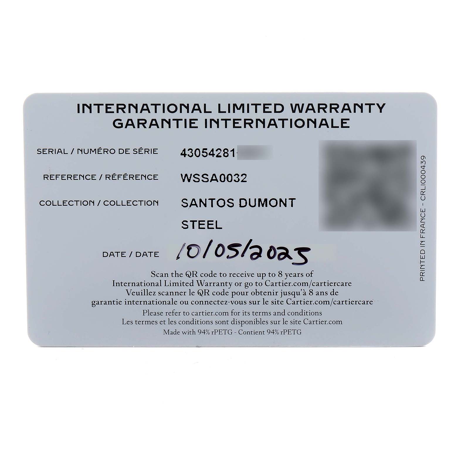 The image shows an International Limited Warranty card for a Cartier Santos Dumont WSSA0032 Men
s Stainless Steel Silver Dial model, displaying its serial number, reference, and date.