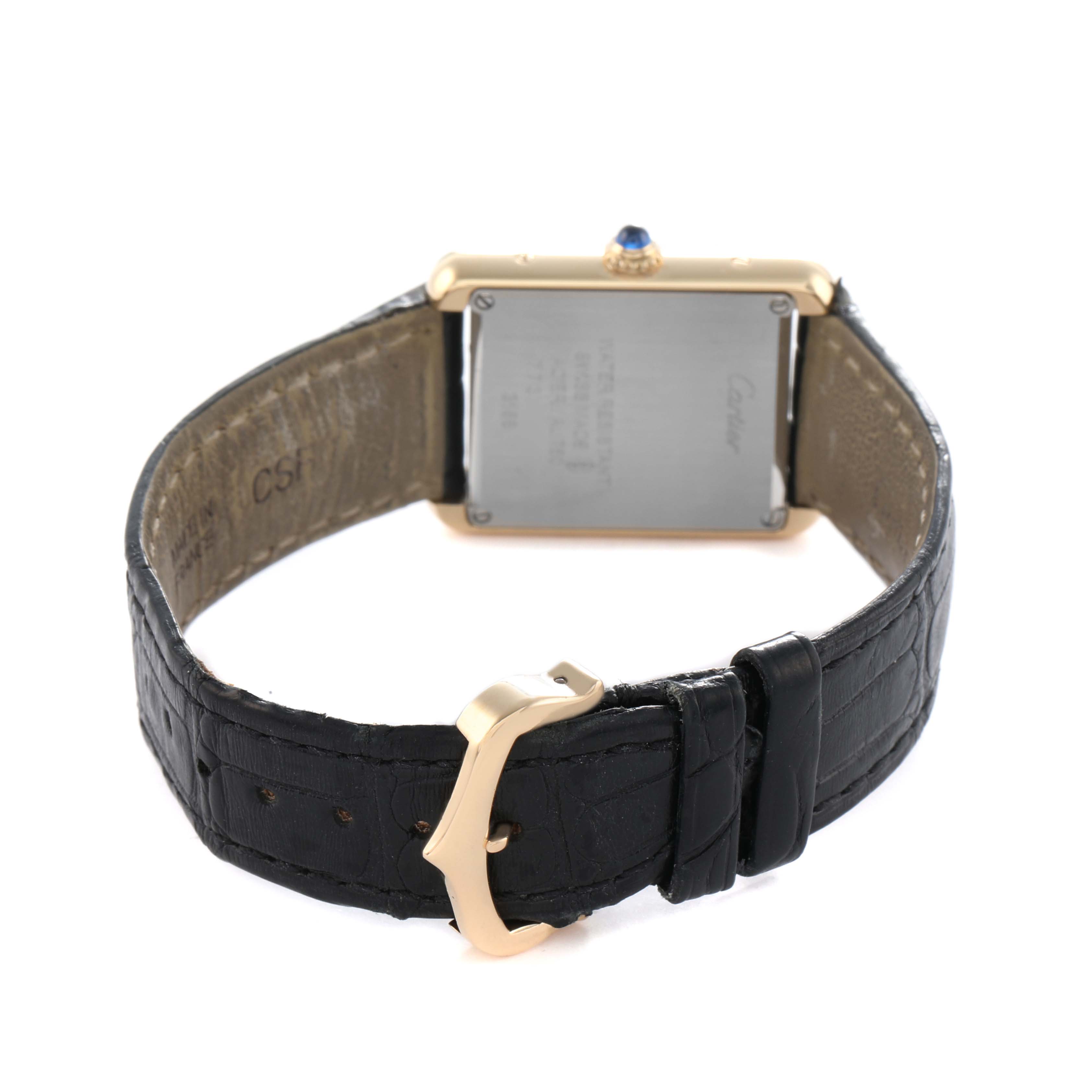 The Cartier Tank Solo W5200002 Men's Steel and Gold (two tone) White Dial watch is shown from the back, displaying its buckle, strap, and caseback.