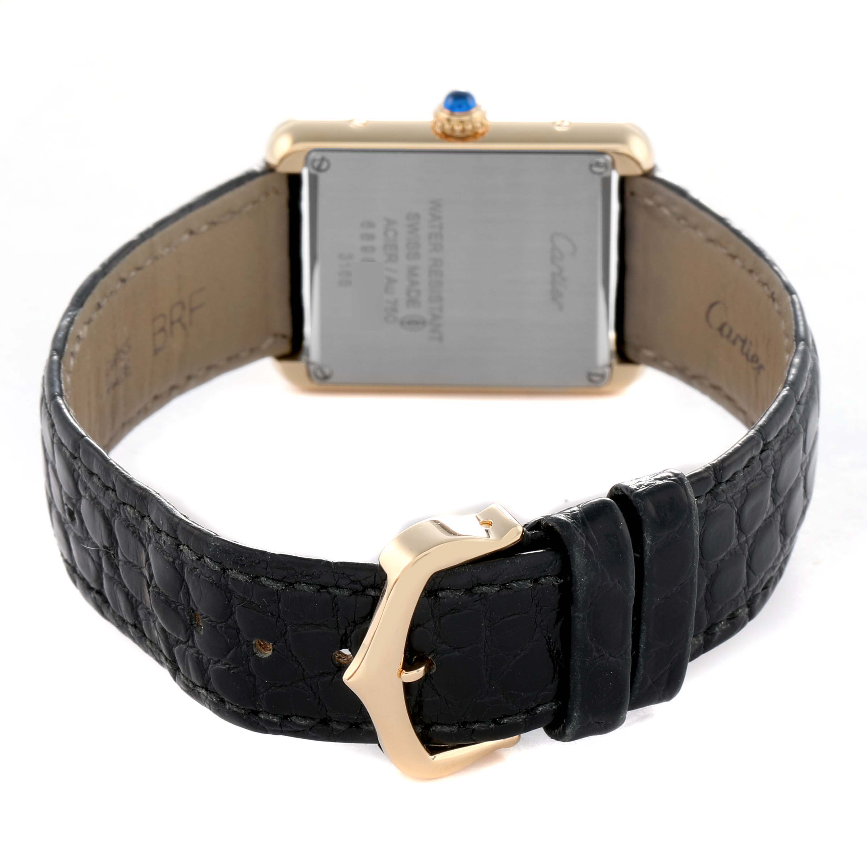 The image shows the back of a Cartier Tank Solo W5200002 Women's Steel and Gold (two tone) Silver Dial watch, highlighting the case back, strap, and buckle.