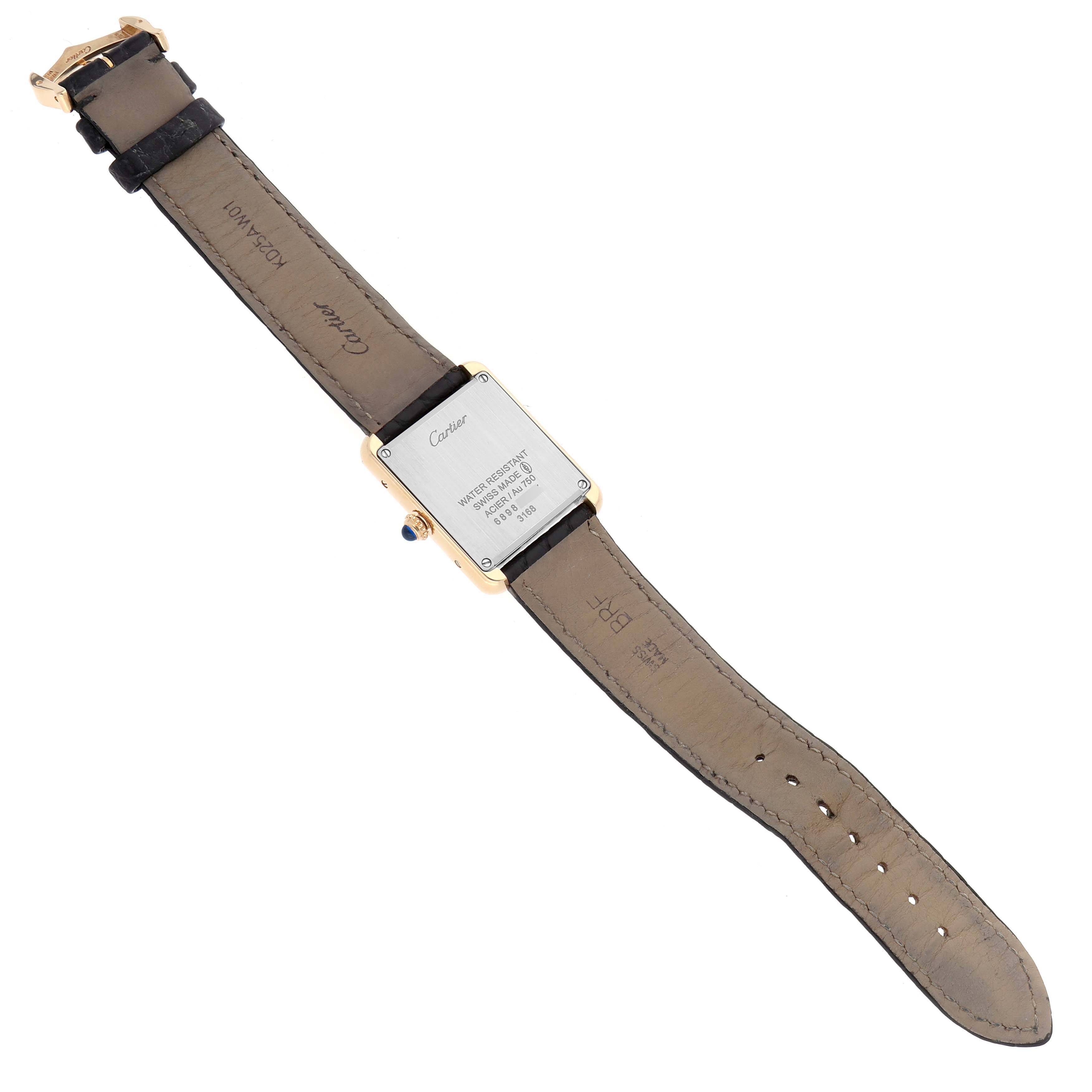 The Cartier Tank Solo W5200002 Women's Steel and Gold (two tone) Silver Dial is shown from the back, displaying the case back, strap, and clasp details.