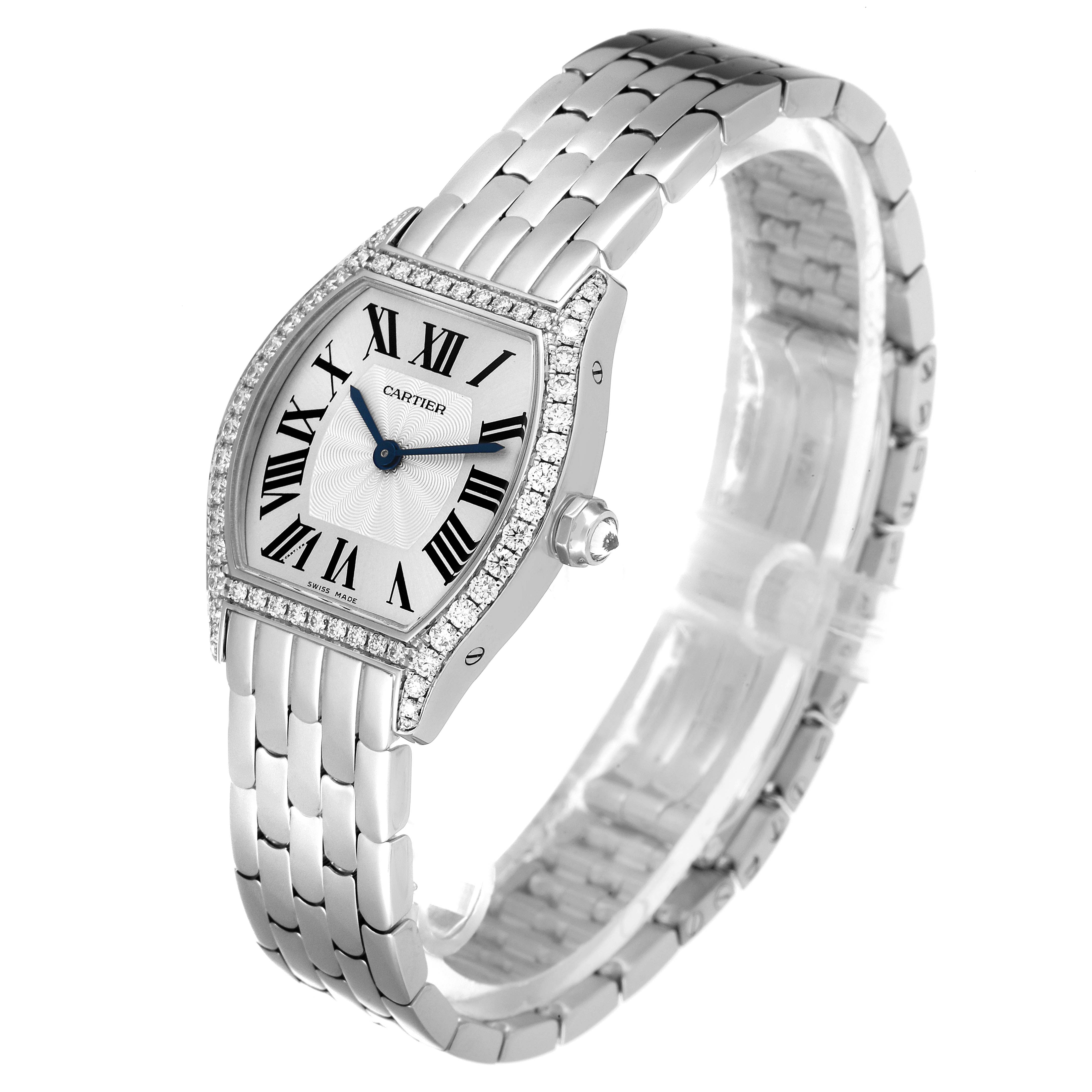 The image shows a Cartier Tortue WA501011 Women's White Gold Silver Dial WA501011 Women's White Gold Silver Dial watch at a 3/4 angle emphasizing its face, bezel, and metal bracelet.