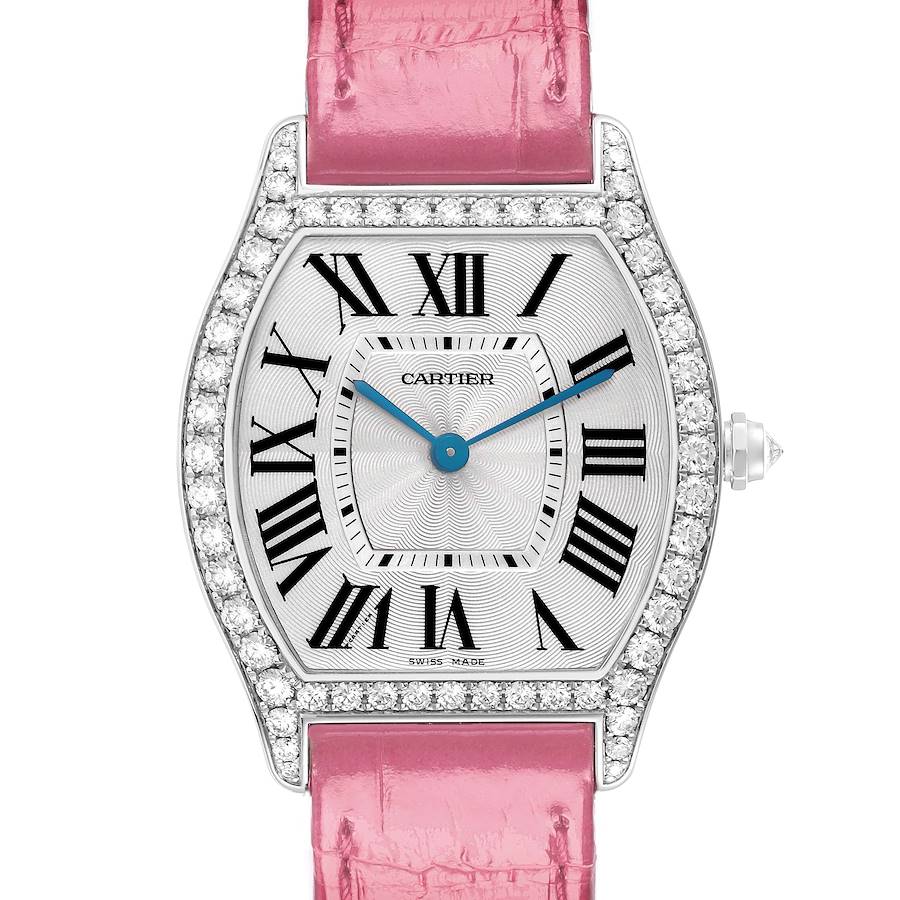 The Cartier Tortue model WA501009 watch is shown from the front, displaying its dial, diamond-encrusted bezel, and pink strap.