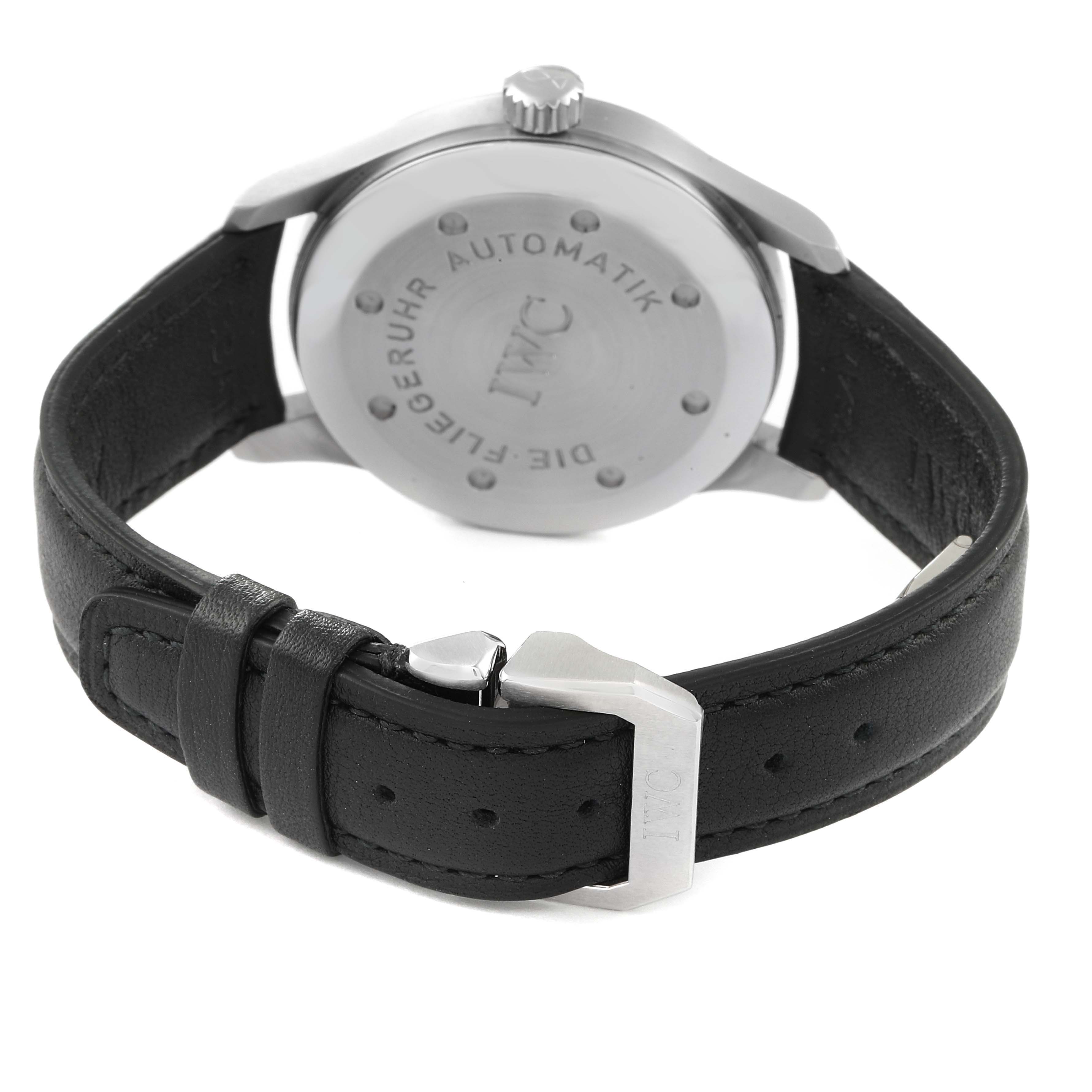 The image shows the back of the IWC Pilot IW325301 Men's Stainless Steel Black Dial IW325301 Men's Stainless Steel Black Dial model watch featuring the case back and black leather strap with the buckle.
