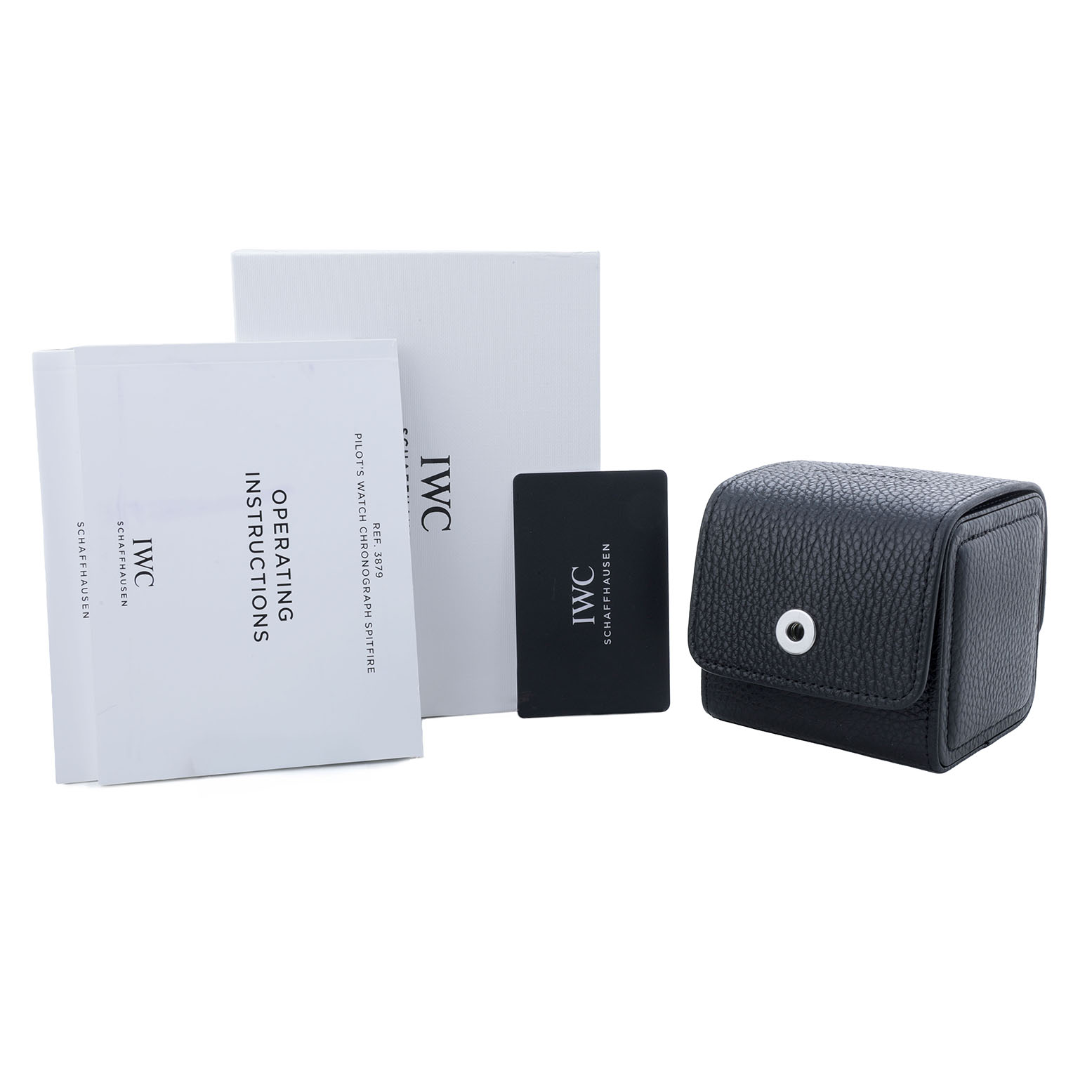 The image shows IWC Pilot IW387902 Men's Bronze Green Dial model accessories, including a black pouch, instruction manuals, and a warranty card.