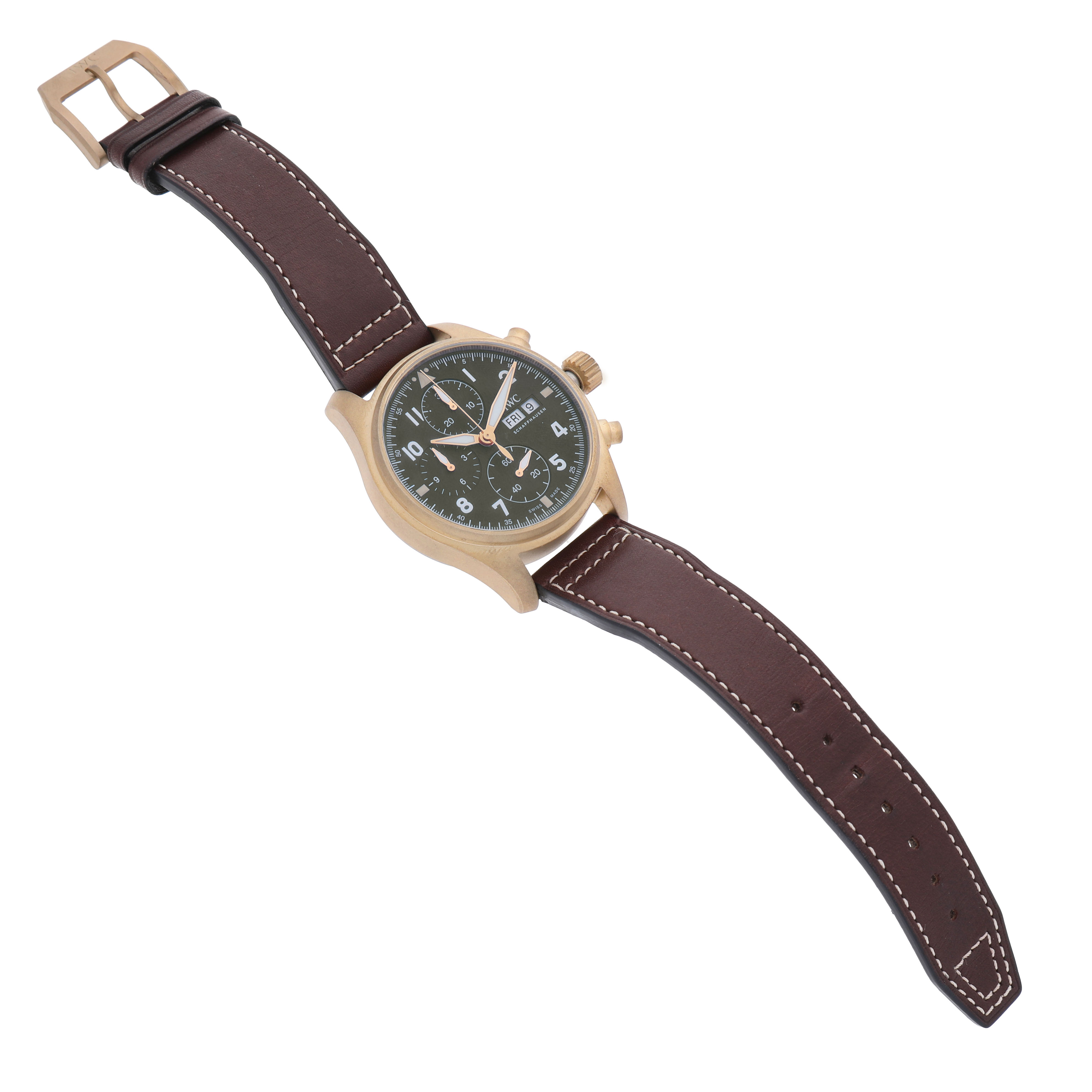 The IWC Pilot IW387902 Men's Bronze Green Dial watch is shown at a slight angle, highlighting the dial, case, crown, pushers, and brown leather strap.
