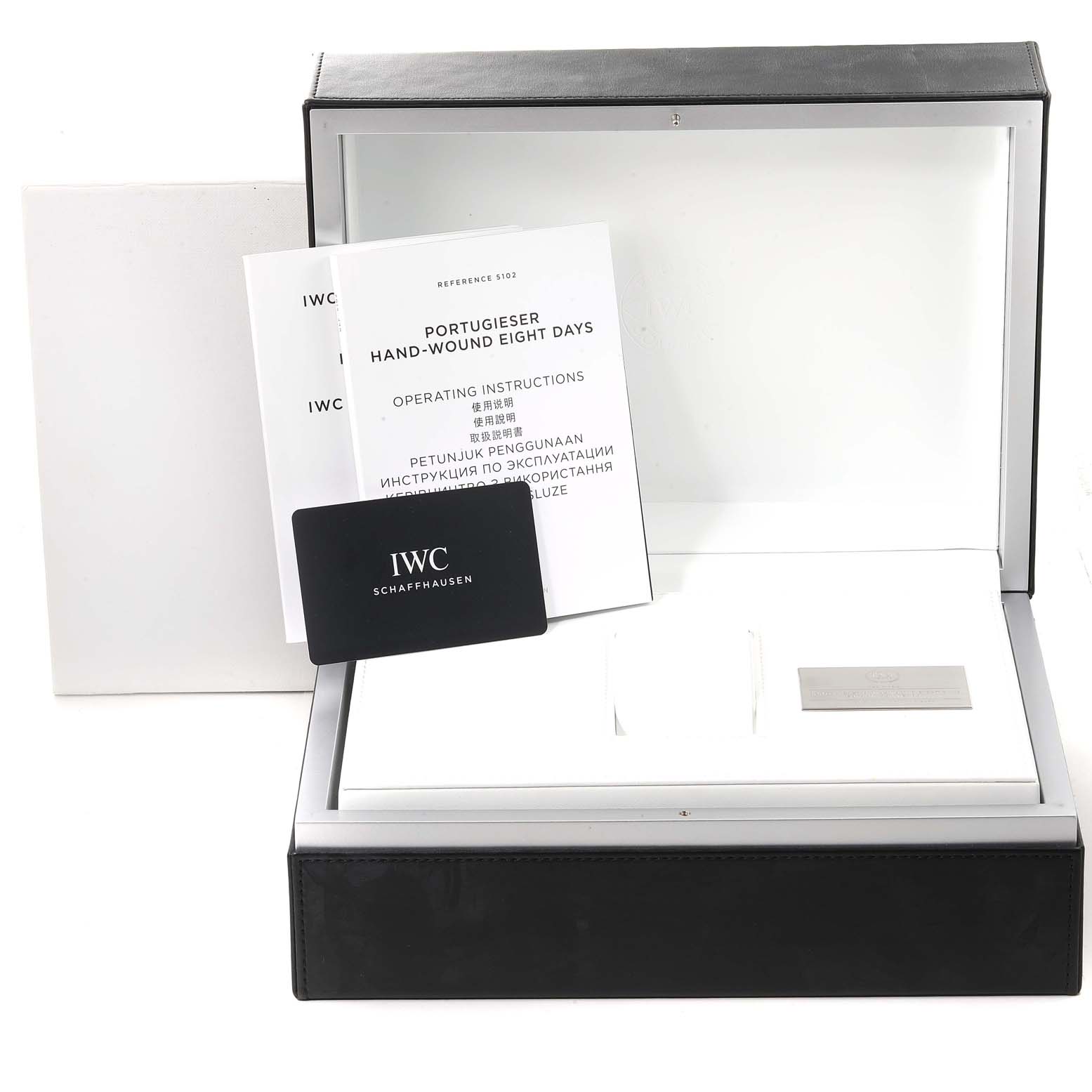 The image shows an open box with manuals and a warranty card for an IWC Portuguese IW510212 Men's Stainless Steel White Dial IW510212 Men's Stainless Steel White Dial model watch.