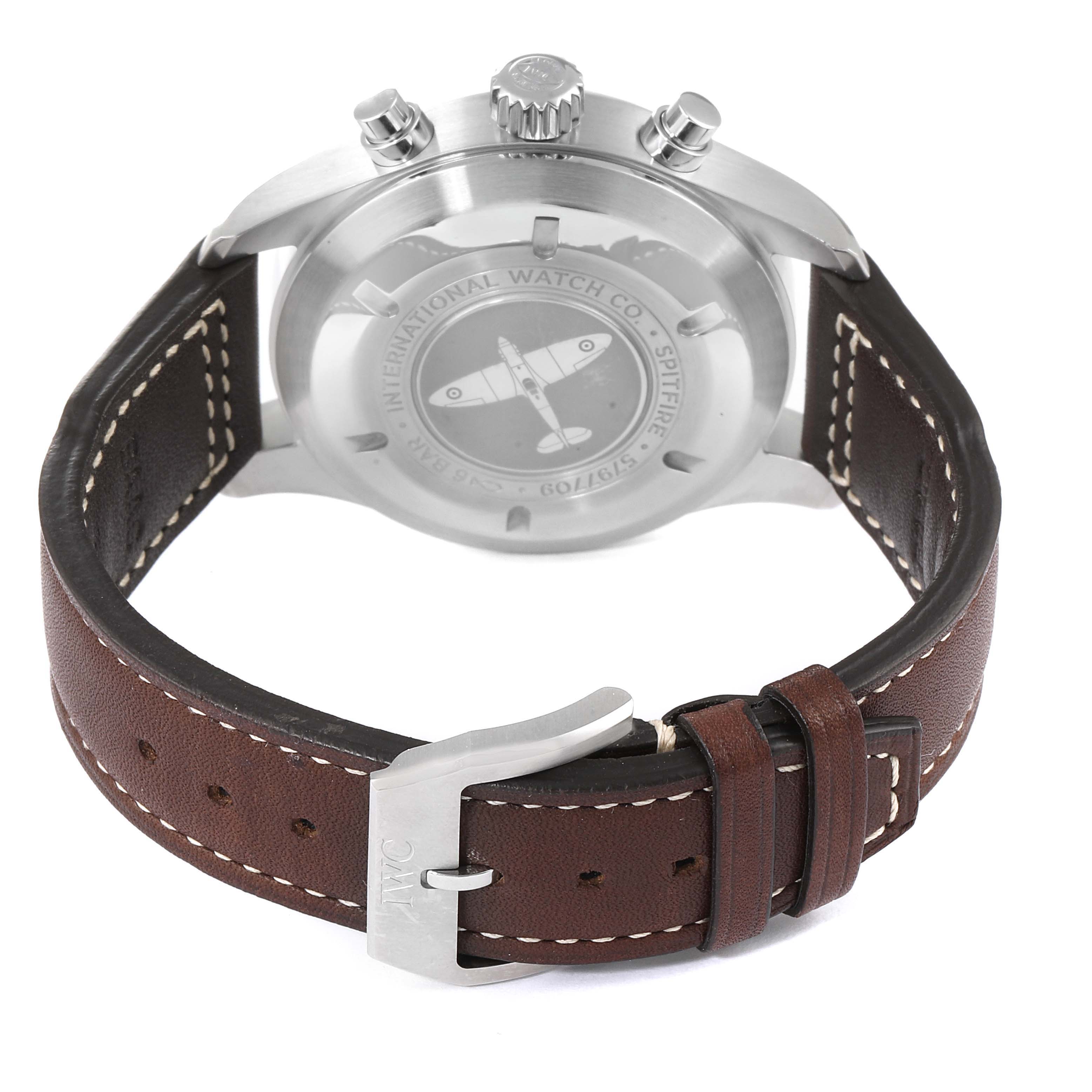 This image shows the back of the IWC Pilot IW387903 Men
s Stainless Steel Black Dial IW387903 Men
s Stainless Steel Black Dial model watch, highlighting its case back, crown, pushers, and brown leather strap with buckle.