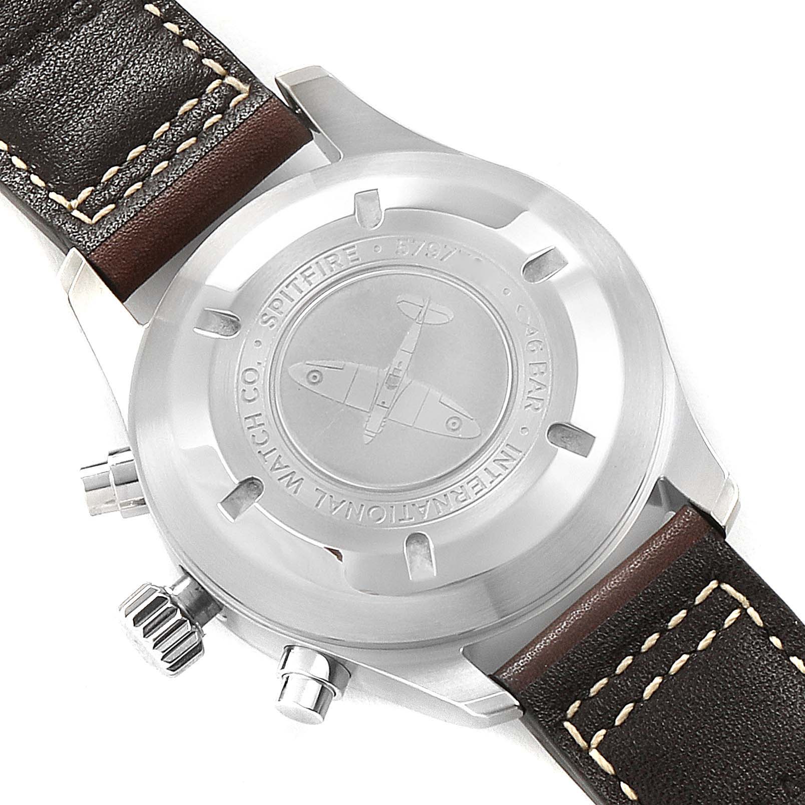 The IWC Pilot IW387903 Men
s Stainless Steel Black Dial IW387903 Men
s Stainless Steel Black Dial watch model is shown from the back, highlighting the engraved case back and leather strap.