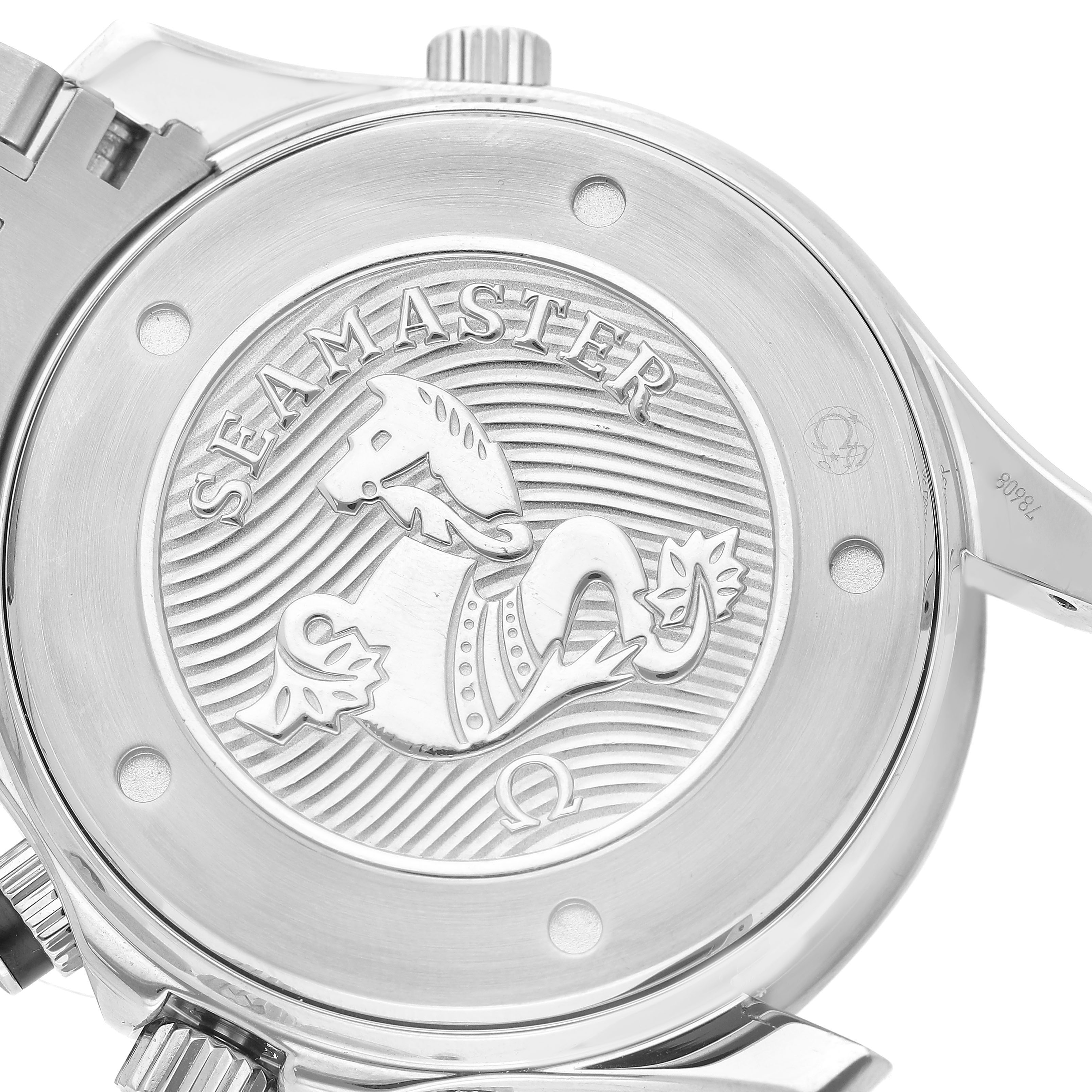 The image shows the case back of an Omega Seamaster 212.30.44.52.01.001 Men's Stainless Steel Black Dial watch, featuring the engraved emblem and branding.