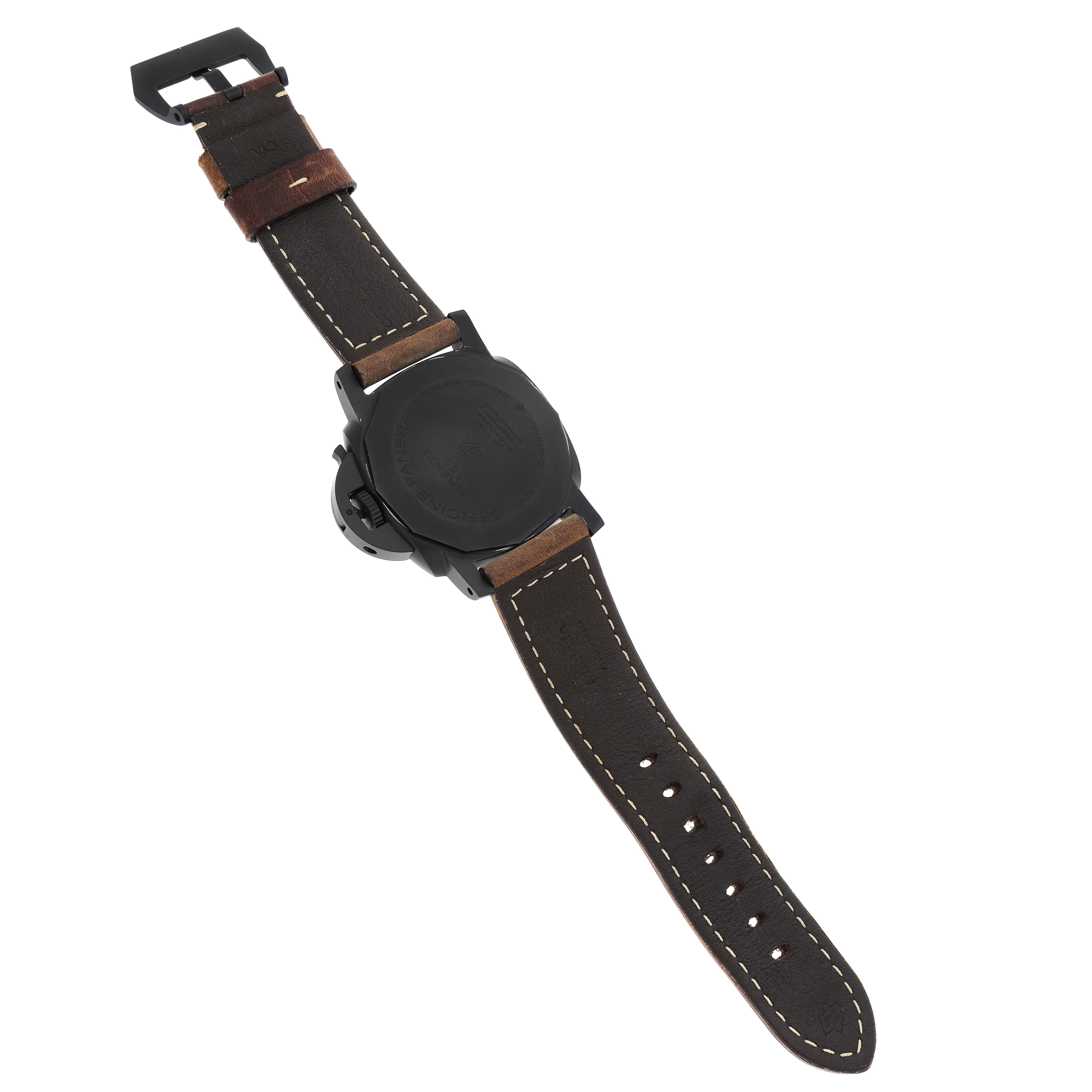 The Panerai Luminor PAM01441 Men's Ceramic Black Dial watch is shown from the back, highlighting the case back and brown leather strap.