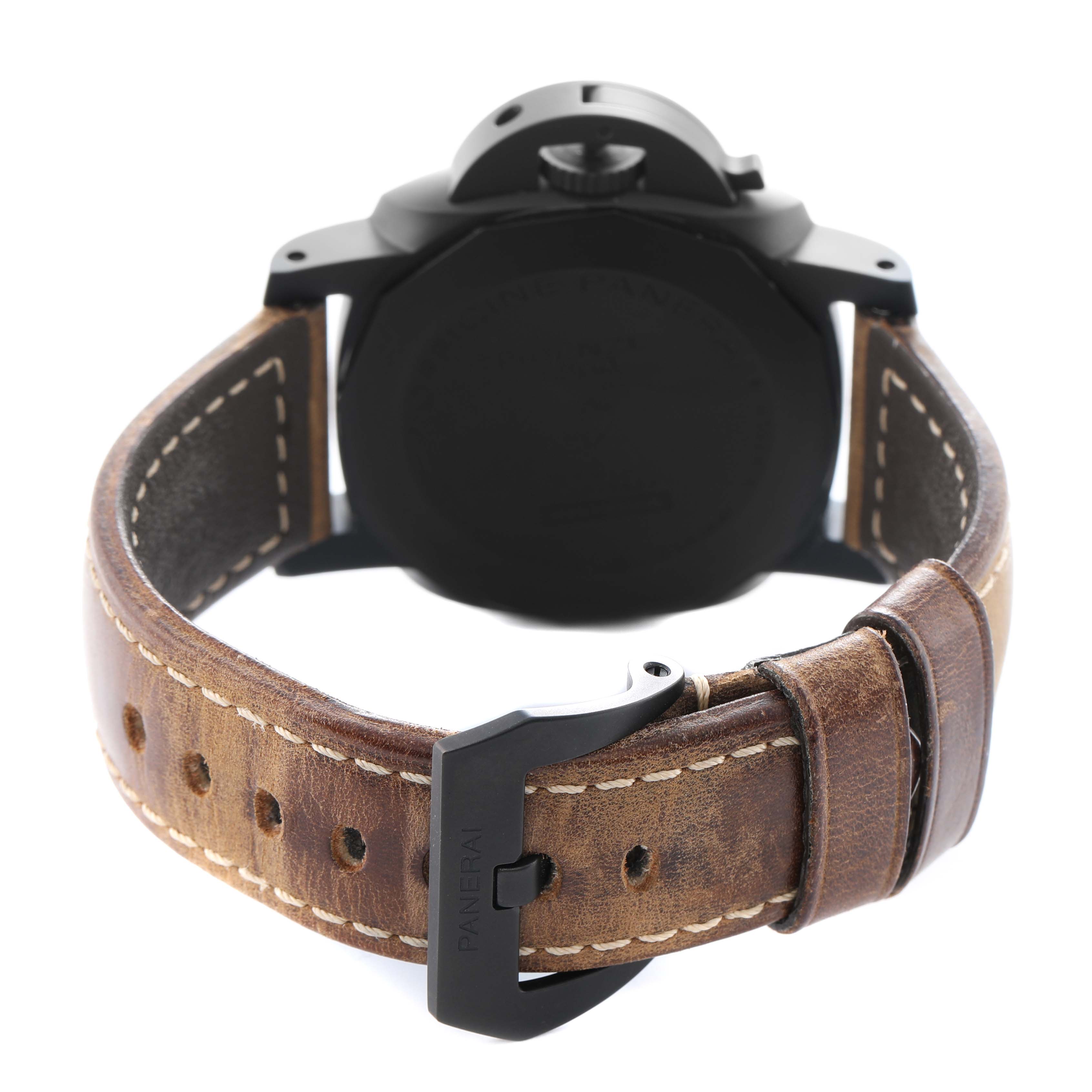 The Panerai Luminor PAM01441 Men's Ceramic Black Dial watch is shown from the back, highlighting the case, crown guard, and leather strap with buckle.