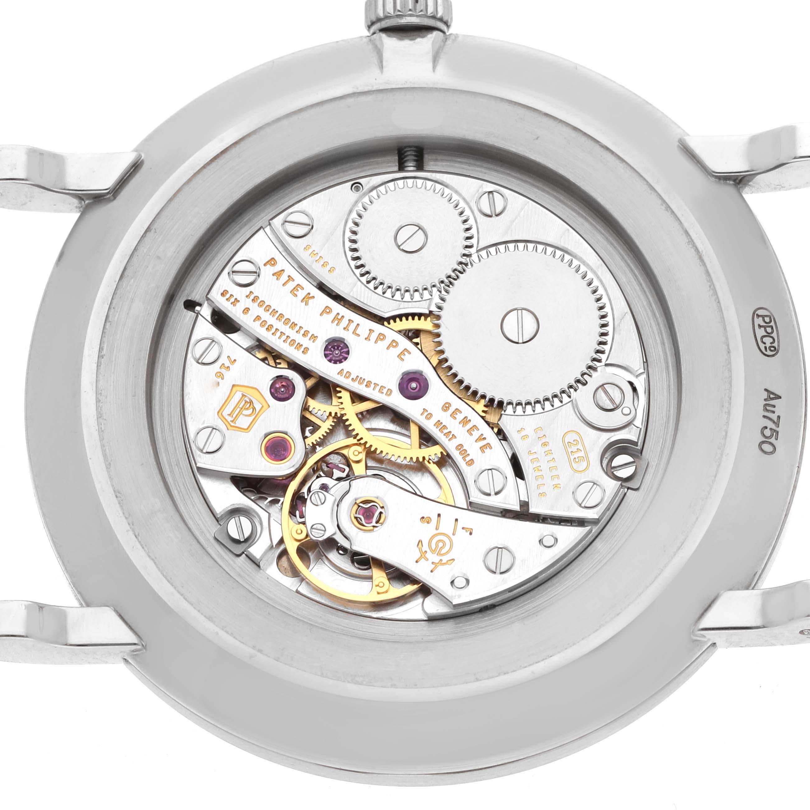 The image shows the movement and inner mechanics of the Patek Philippe Calatrava 5119G Men
s White Gold White Dial watch from a rear angle.