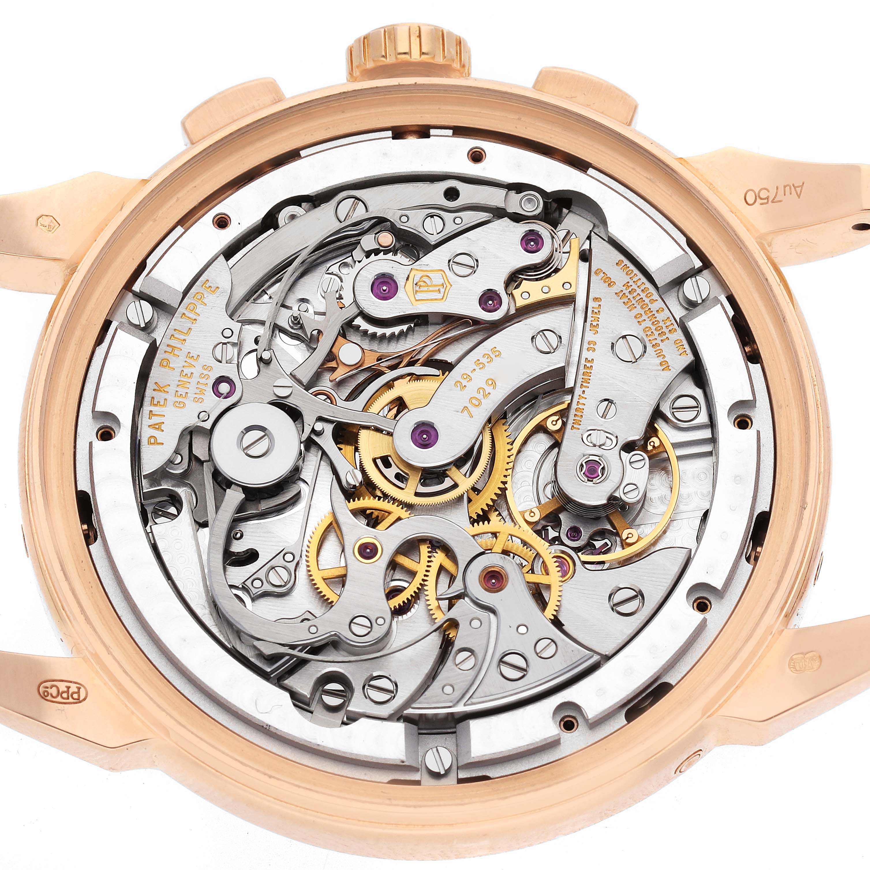 The image shows the back of a Patek Philippe Complications 5270R-001 Men's Rose Gold Silver Dial watch, highlighting its intricate mechanical movement.