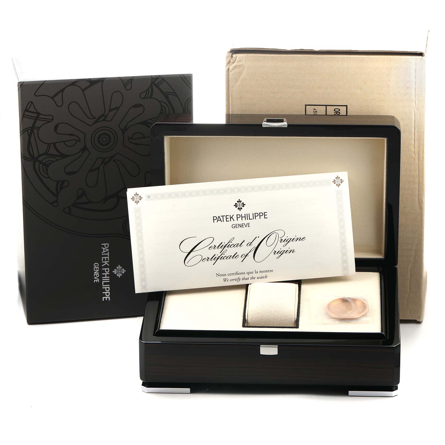 The image shows the open box of a Patek Philippe Complications 5270R-001 Men's Rose Gold Silver Dial watch, including a certificate of origin and a clear case back.