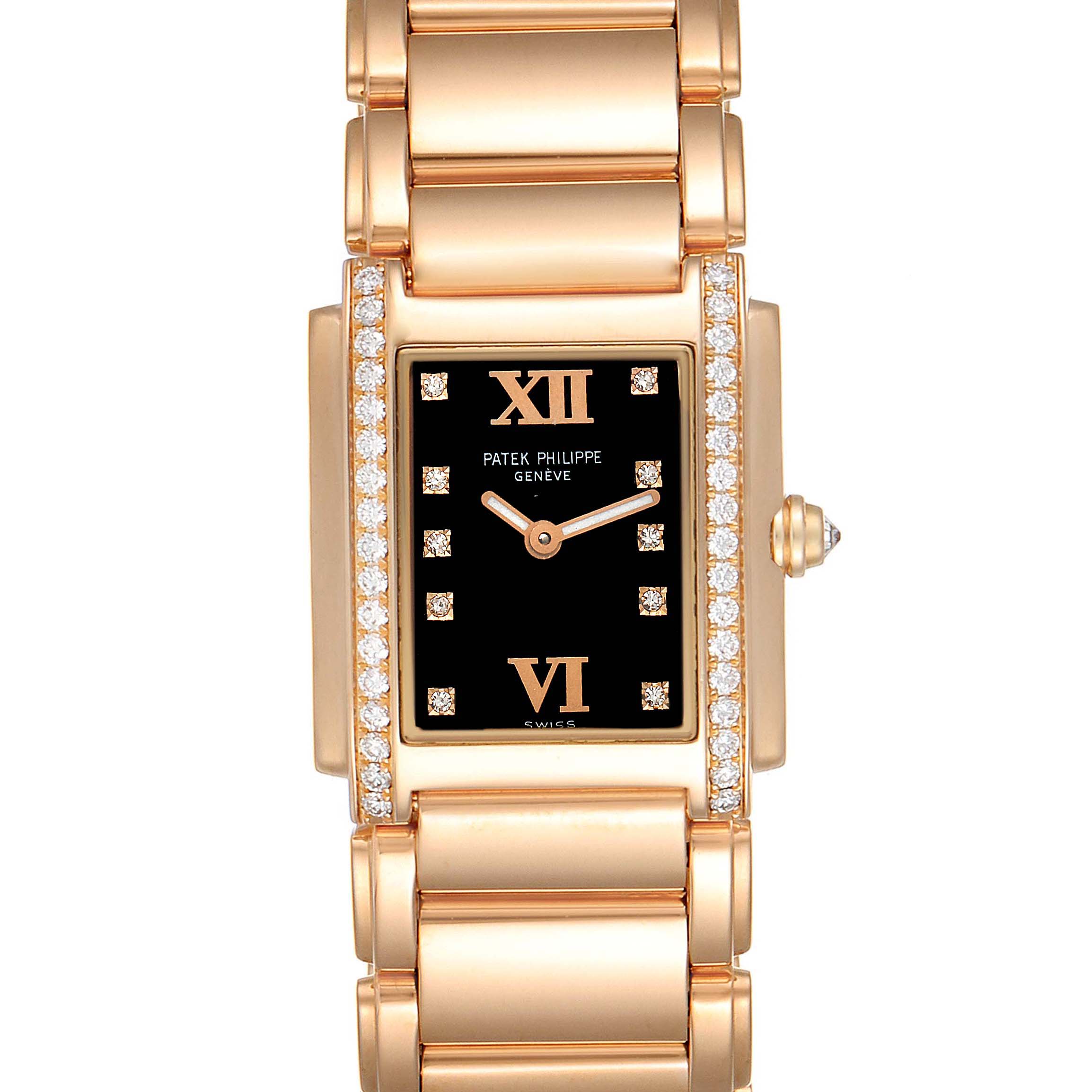 The image shows a front view of the Patek Philippe Twenty-4 4910/11R Women
s Rose Gold Black Dial 4910/11R Women
s Rose Gold Black Dial model watch, showcasing its rectangular black dial, diamond accents, and gold bracelet.