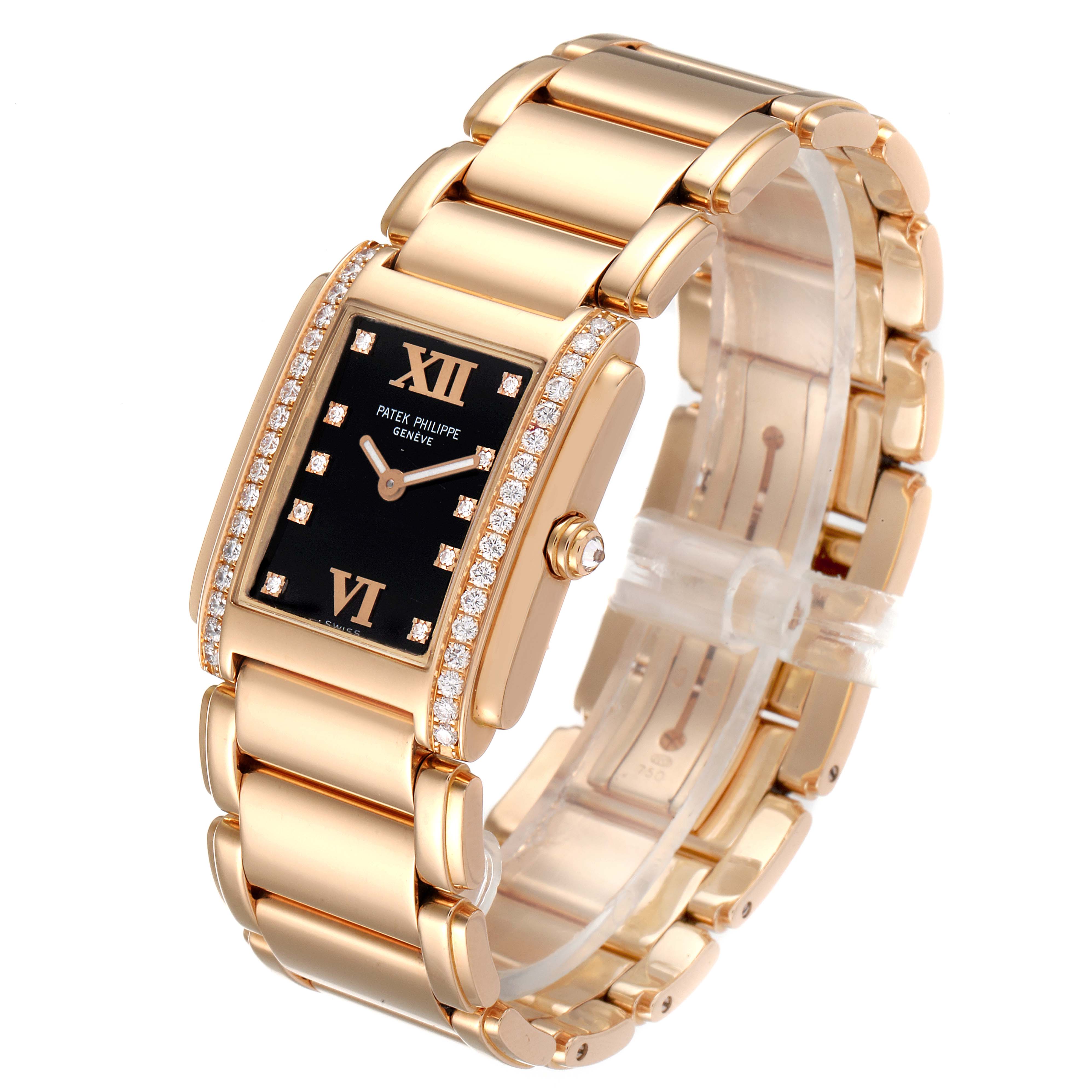 The image shows a Patek Philippe Twenty-4 4910/11R Women
s Rose Gold Black Dial 4910/11R Women
s Rose Gold Black Dial watch at a three-quarter angle, highlighting its gold bracelet and diamond-encrusted bezel.