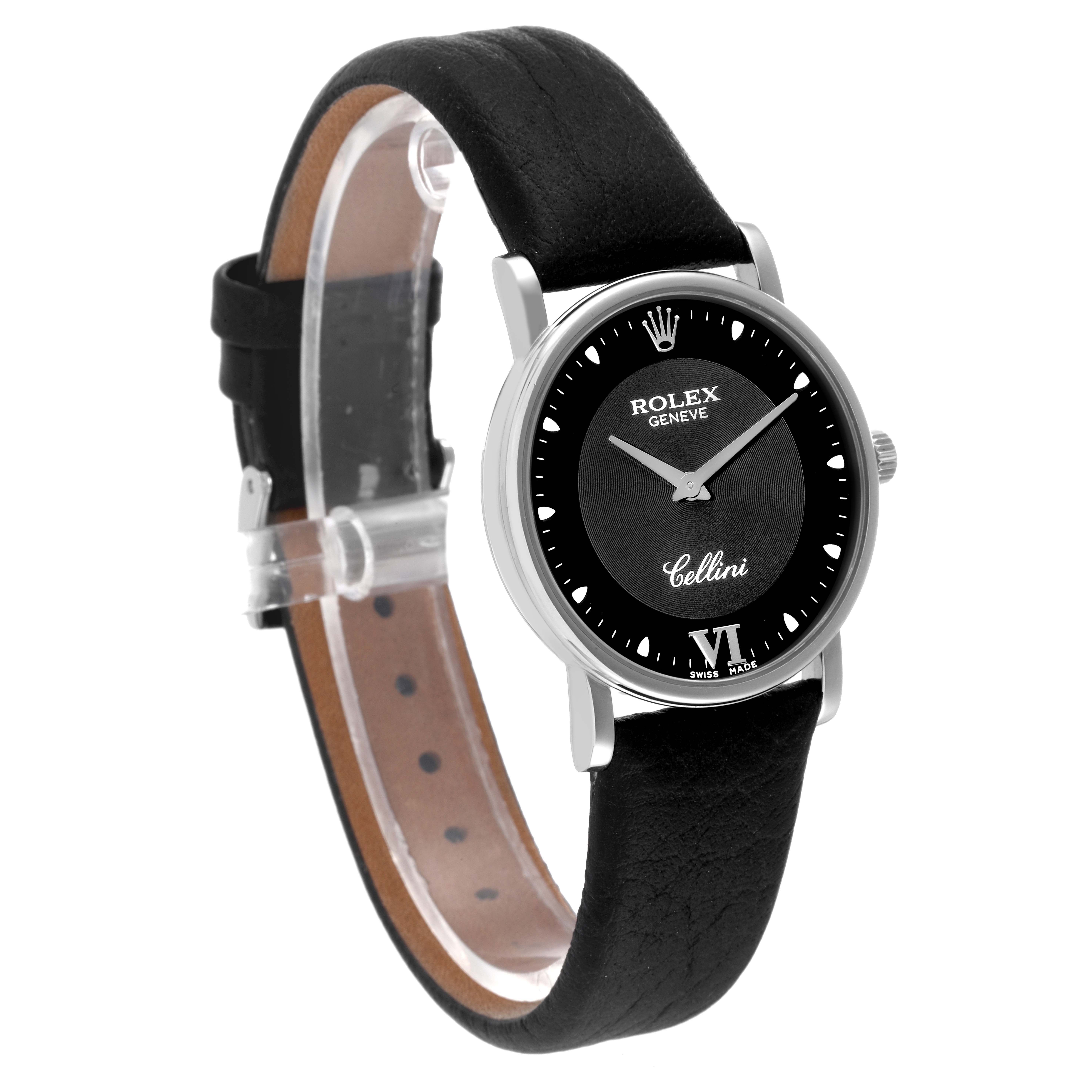 The image shows a side angle of a Rolex Cellini 5115 Men
s White Gold Black Dial 5115 Men
s White Gold Black Dial watch, highlighting the black leather band and black watch face.