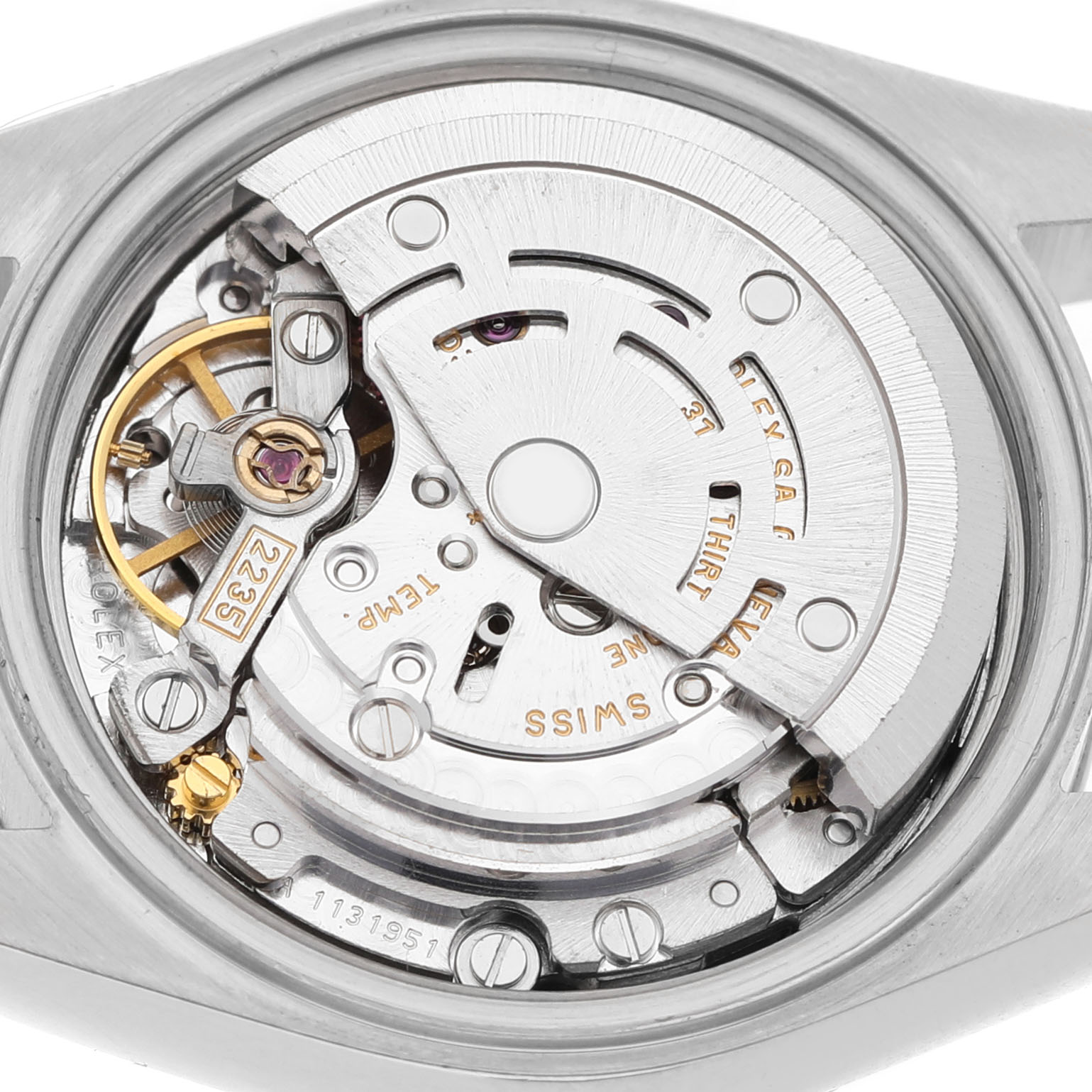 The image shows the internal mechanism of a Rolex Datejust 79174 Women's Stainless Steel White Dial watch, highlighting the movement components.