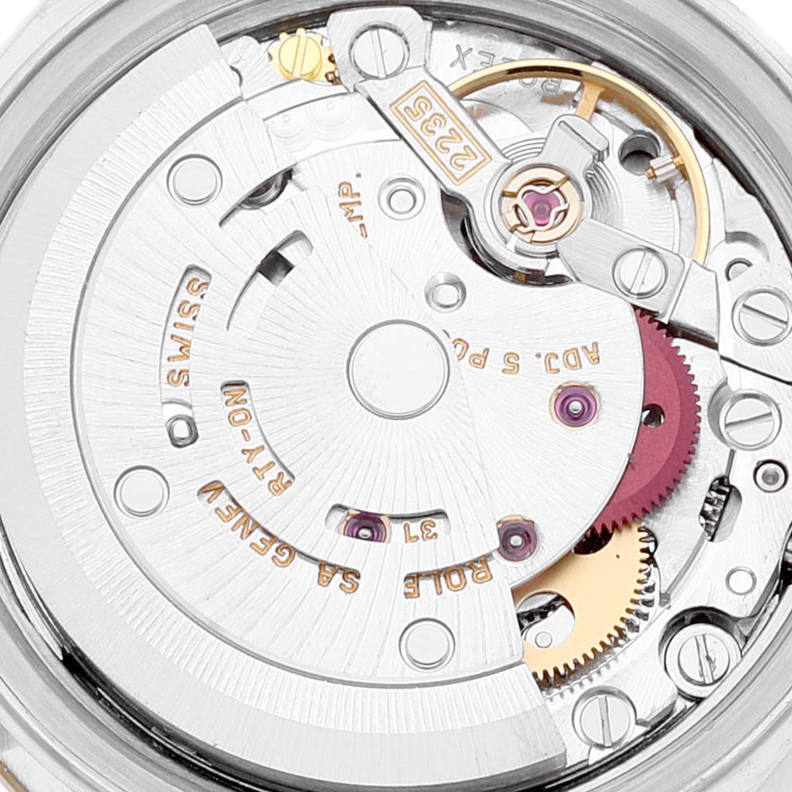 This image shows a close-up of the movement mechanism of a Rolex Datejust 79173 Women's Steel and Gold (two tone) White Dial 79173 Women's Steel and Gold (two tone) White Dial watch.