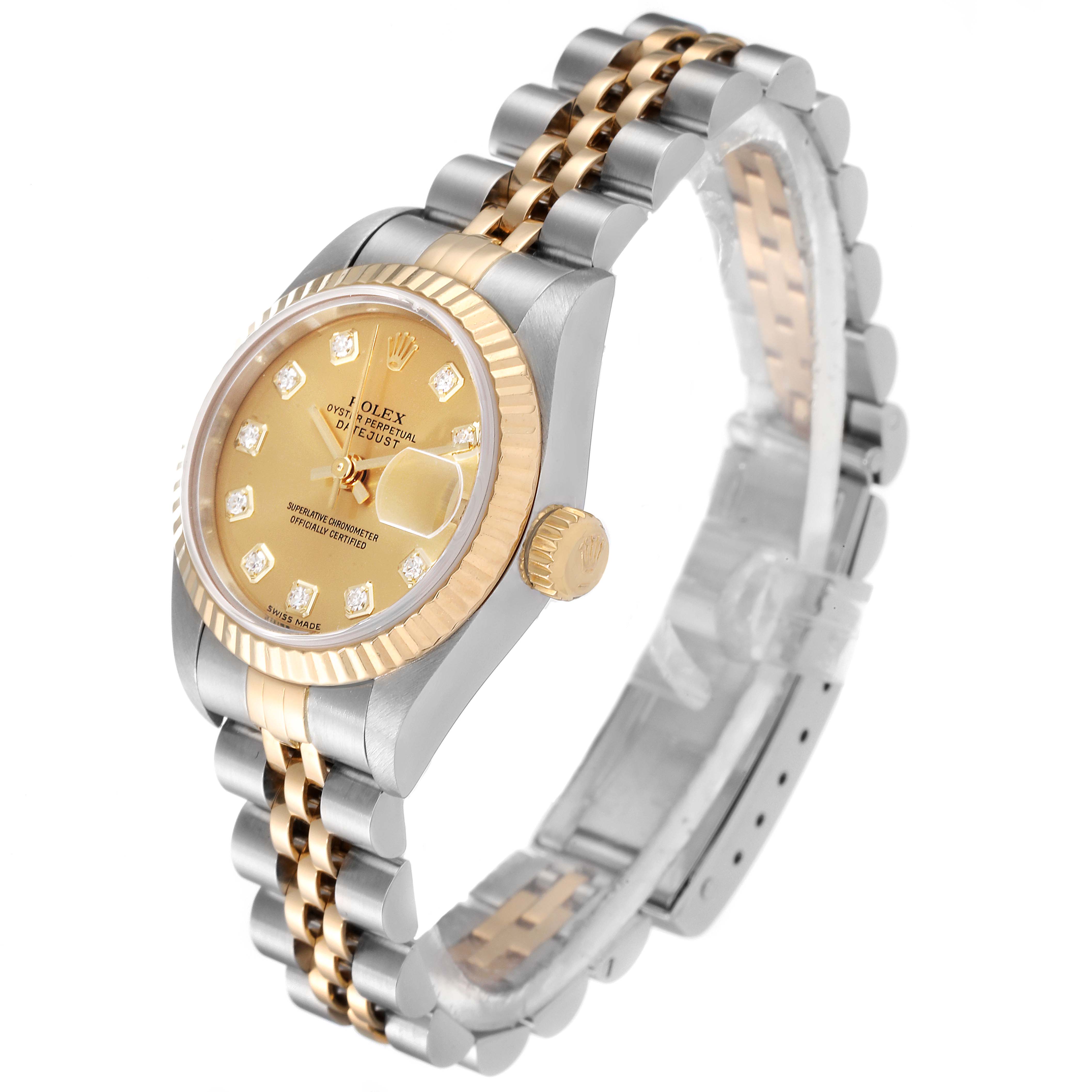 The Rolex Datejust 69173 Women's Steel and Gold (two tone) Champagne Dial 69173 Women's Steel and Gold (two tone) Champagne Dial watch is shown at an angle, highlighting its gold and steel Jubilee bracelet, fluted bezel, and champagne dial.