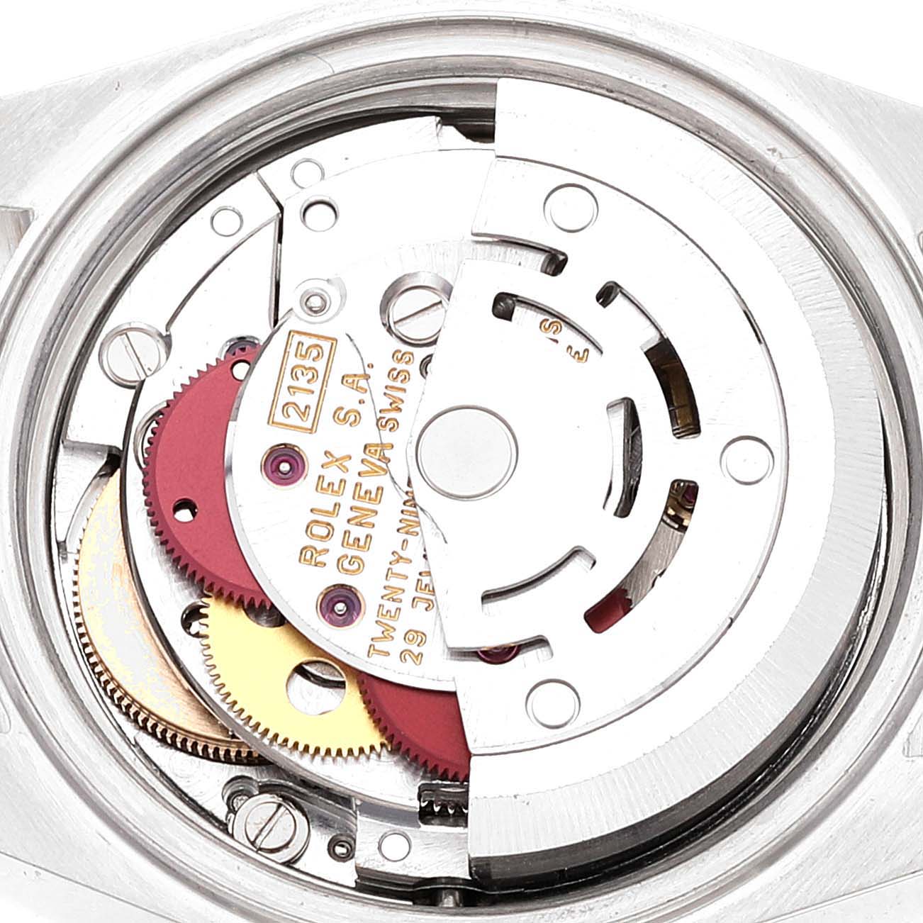 The image shows an internal view of a Rolex Datejust 69173 Women's Steel and Gold (two tone) Champagne Dial 69173 Women's Steel and Gold (two tone) Champagne Dial watch, highlighting its movement and gears.