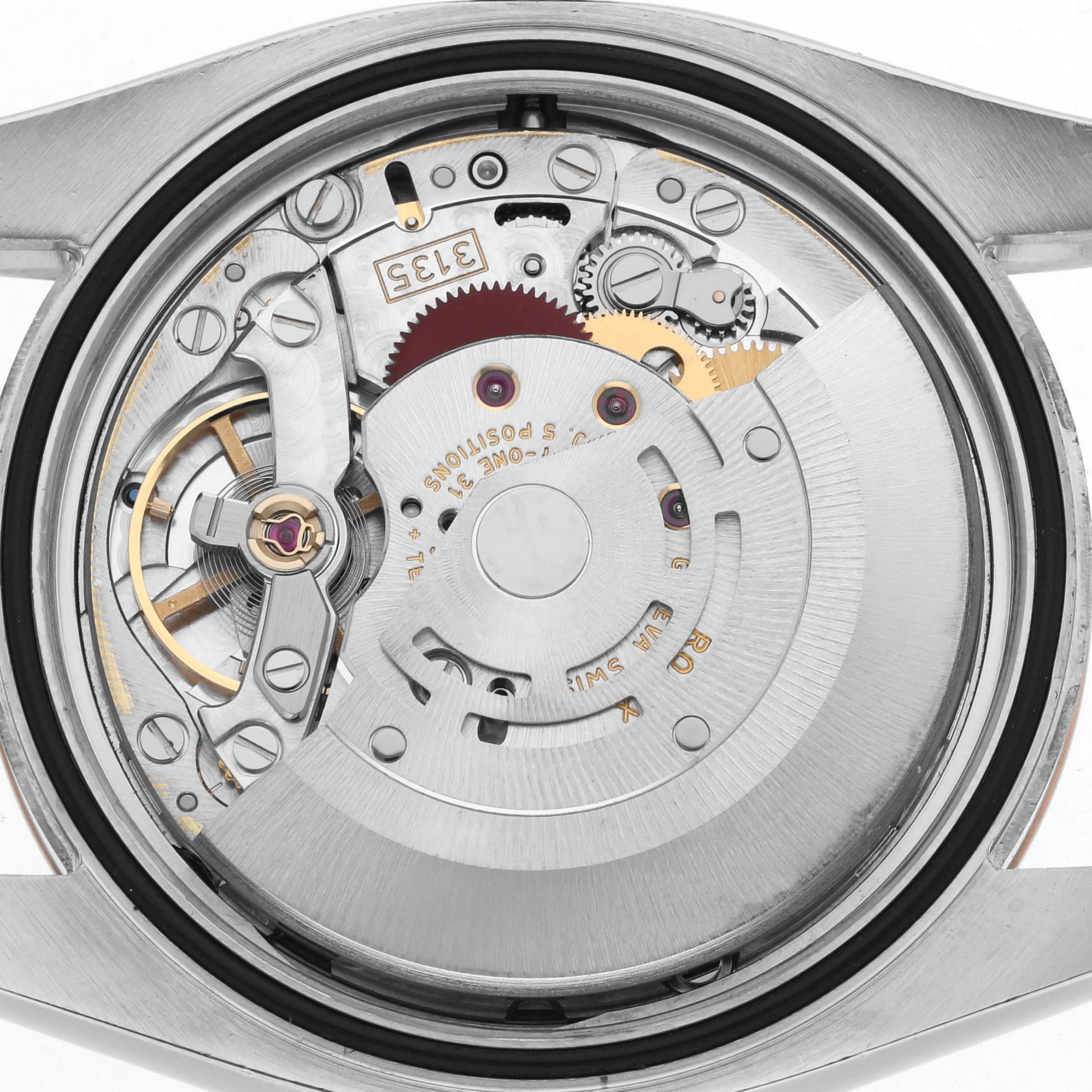 The image shows the movement of a Rolex Datejust 116231 Men's Steel and Gold (two tone) White Dial from a top-down angle, displaying gears and components of the watch mechanism.