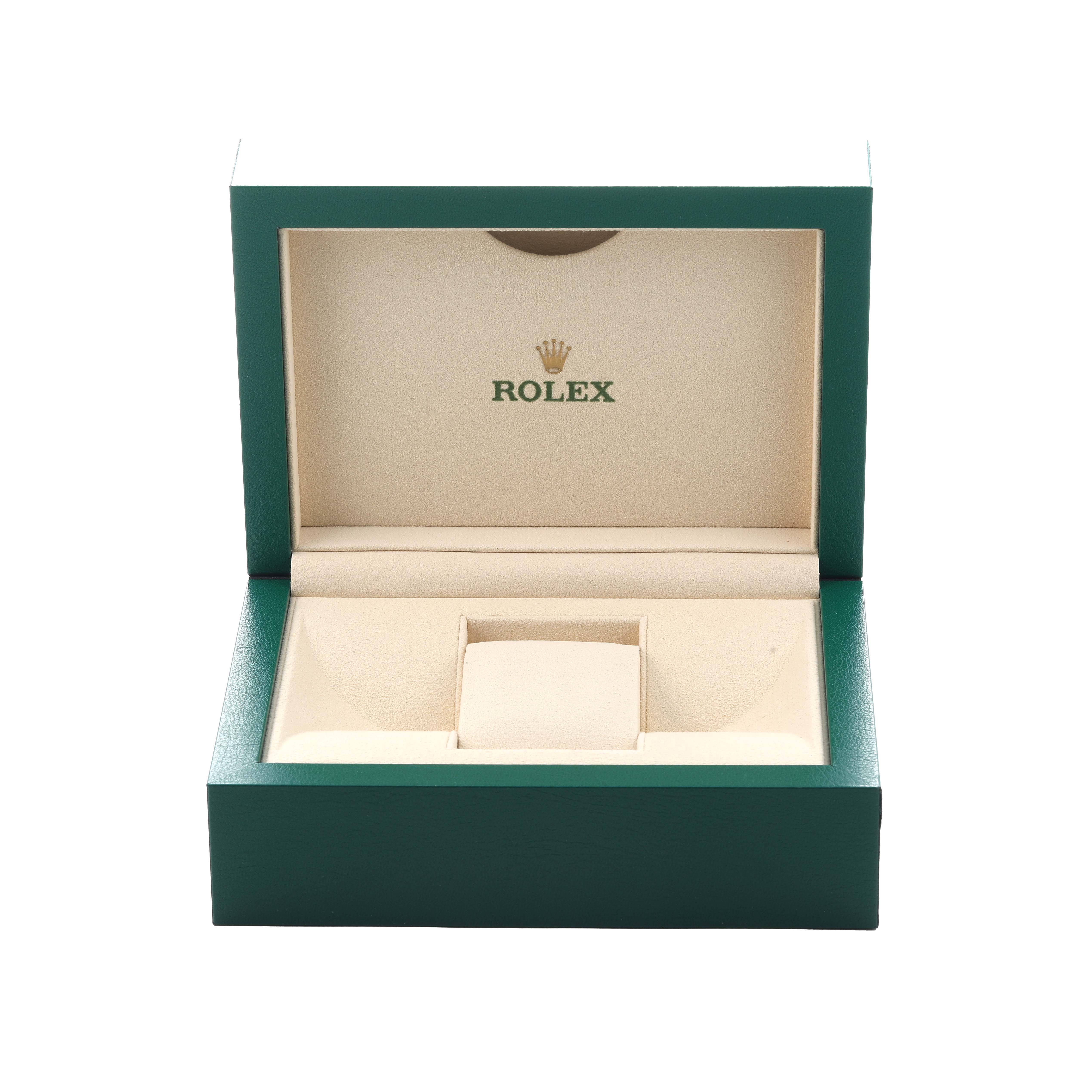 The image shows an open green Rolex box for the Datejust model, displaying the brand logo inside.