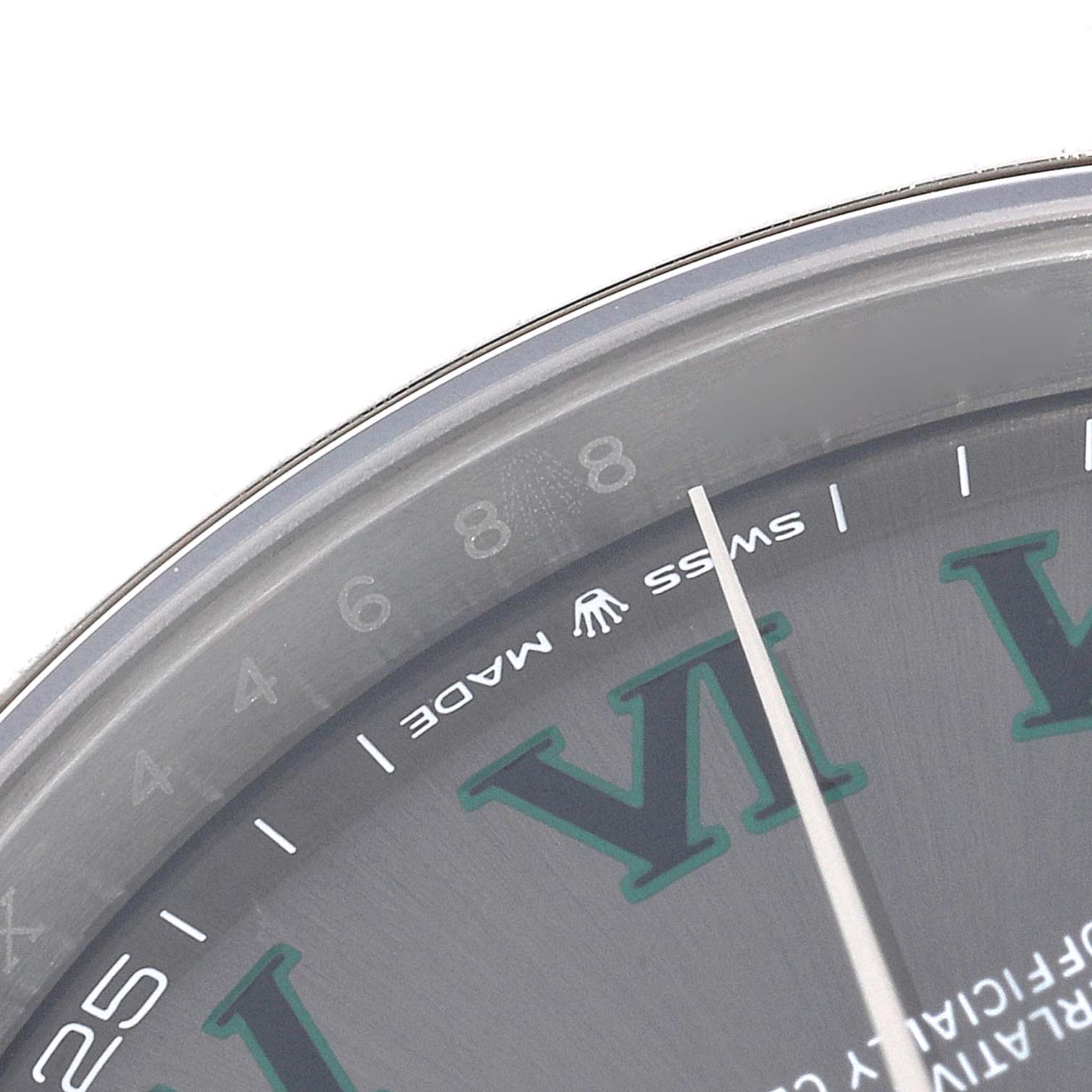 The image shows a close-up of the dial and minute hand of a Rolex Datejust 41 126300 Men
s Stainless Steel Grey Dial 126300 Men
s Stainless Steel Grey Dial watch, capturing the "SWISS MADE" text and part of the Roman numeral VI.