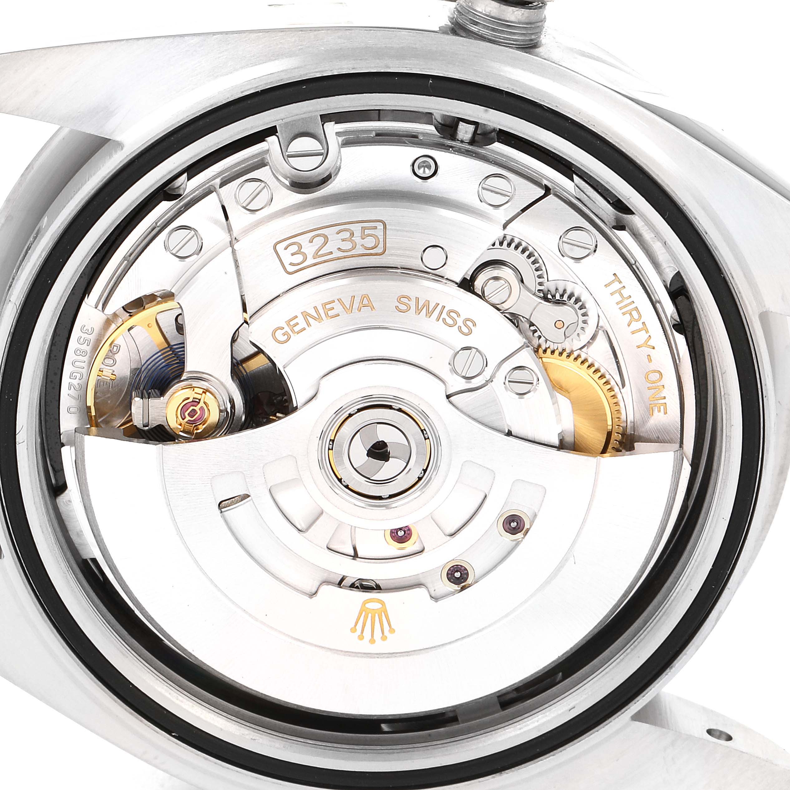 The image shows the inner mechanism of the Rolex Datejust 41 126334 Men
s Stainless Steel Black Dial 126334 Men
s Stainless Steel Black Dial watch, highlighting the movement and intricate gears.
