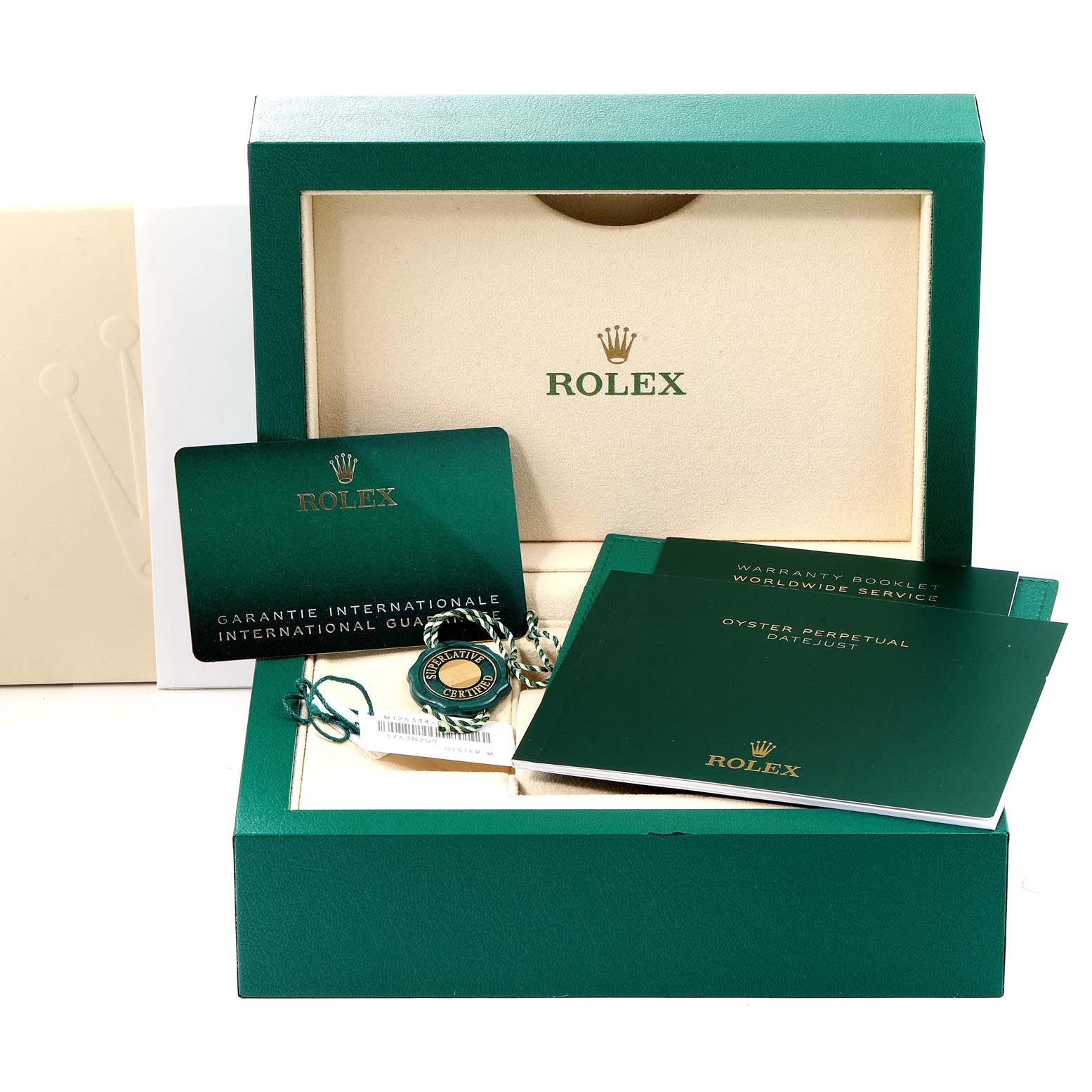 The image shows the packaging and accessories of a Rolex Datejust 41 126334 Men
s Stainless Steel Black Dial 126334 Men
s Stainless Steel Black Dial, including warranty booklets, a hang tag, and an international guarantee card.