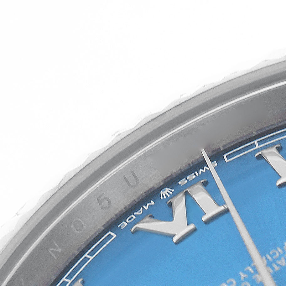 The image shows a close-up of the Datejust 41 by Rolex, highlighting the blue dial, Roman numerals, and part of the bezel.