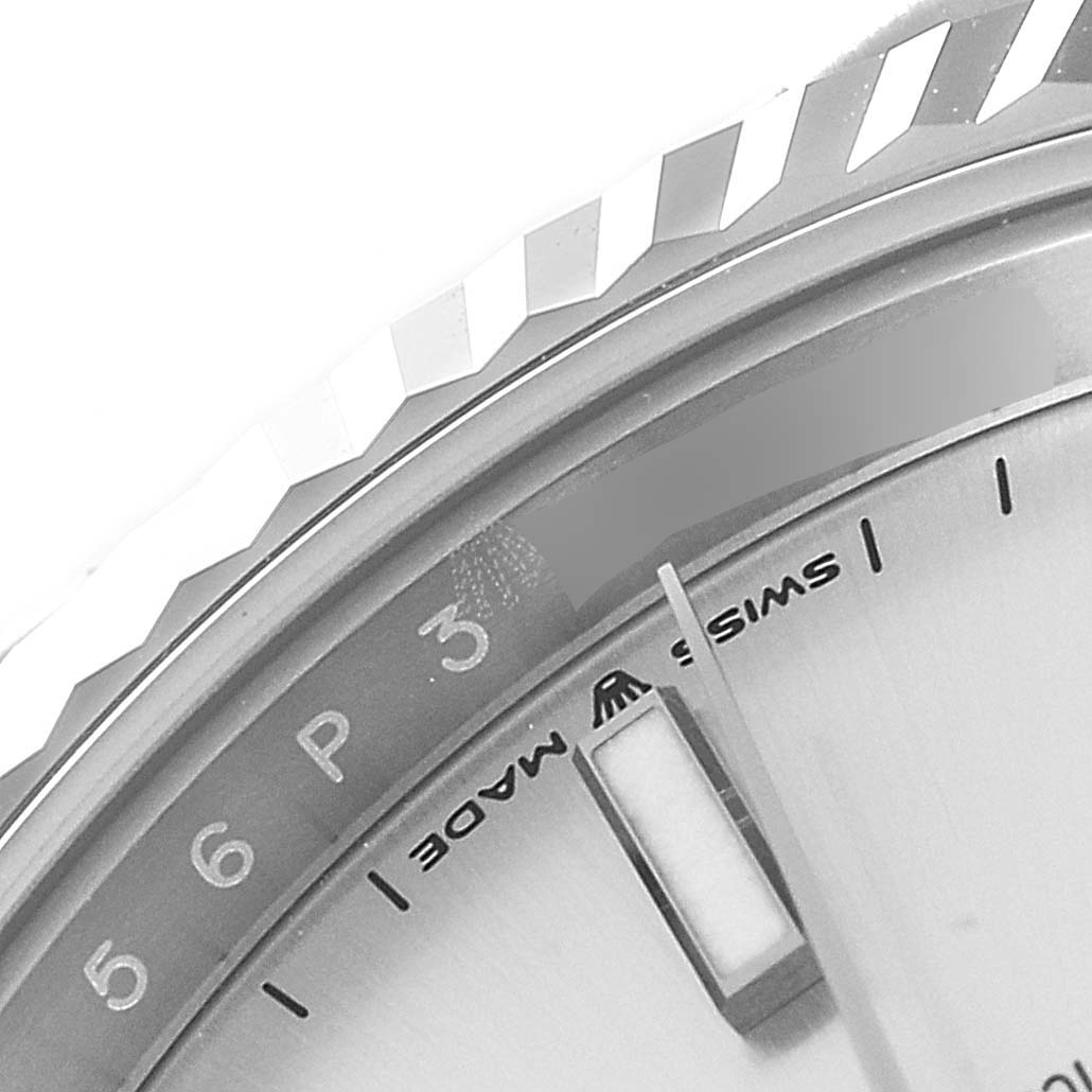 The image shows a close-up of the dial, hands, and part of the bezel of a Rolex Datejust 41 126334 Men
s Stainless Steel Silver Dial 126334 Men
s Stainless Steel Silver Dial watch.