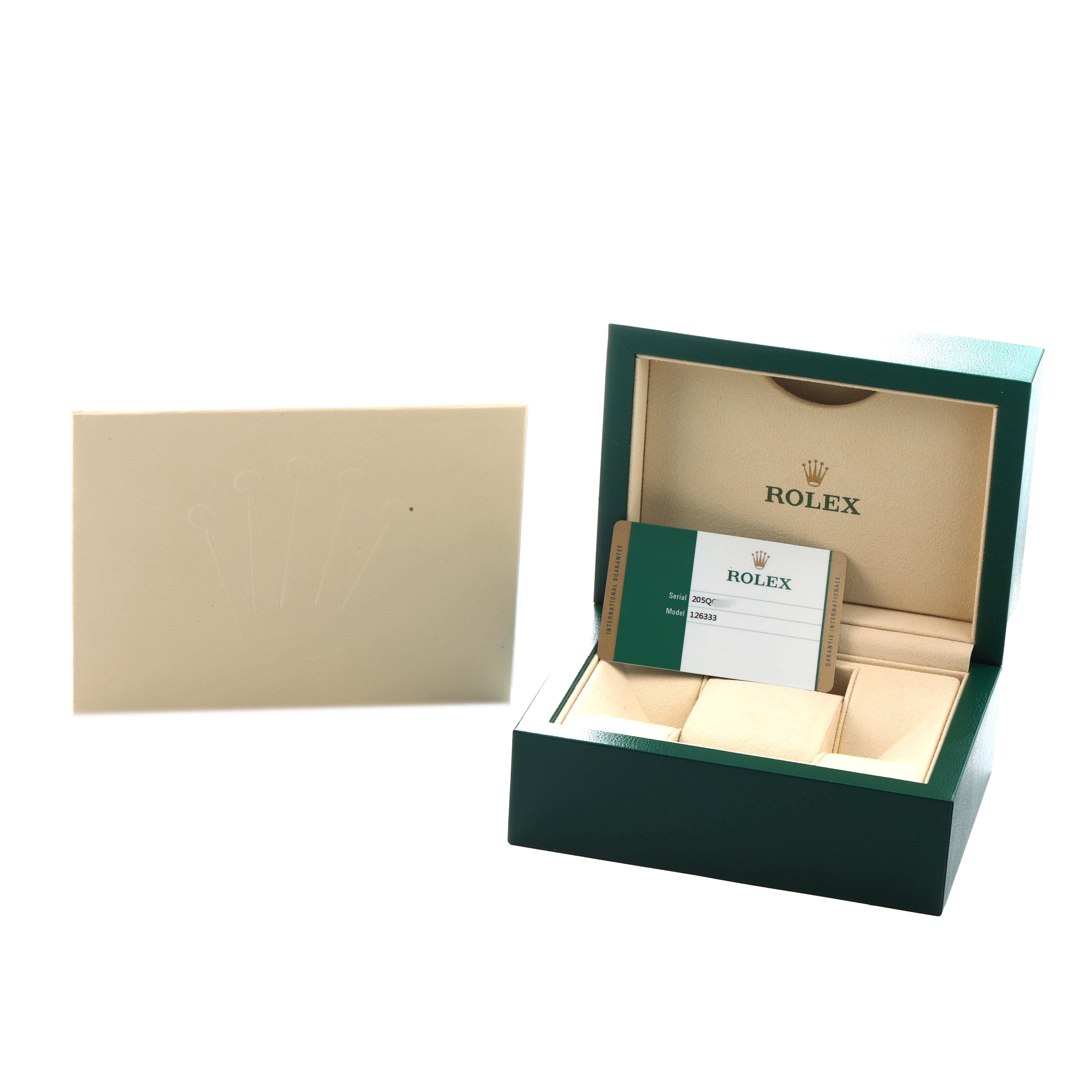 The image shows a Rolex Datejust 41 126333 Men's Steel and Gold (two tone) Black Dial watch box with a warranty card and documentation.