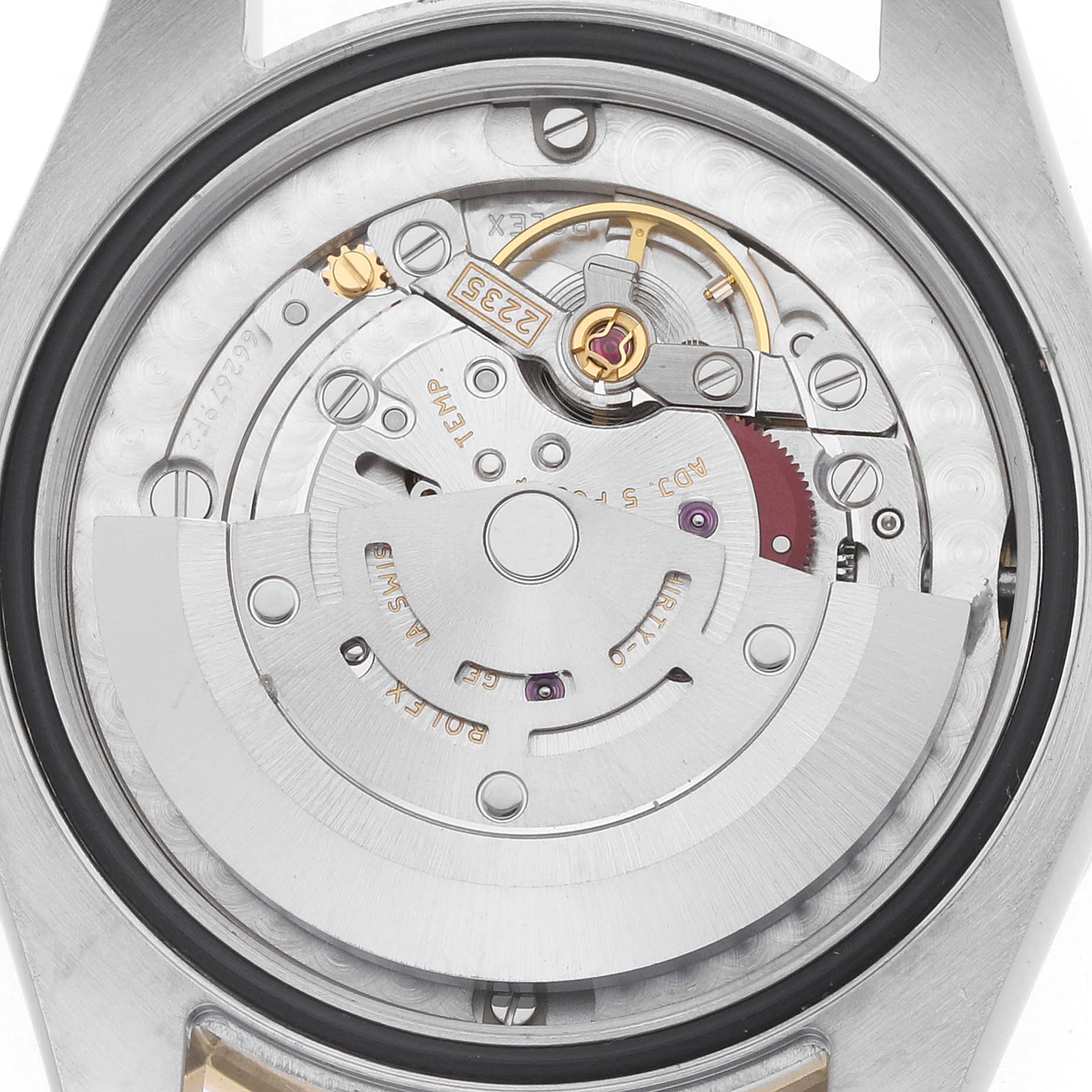 The image shows the back view of a Rolex Mid-Size 178383 Women's Steel and Gold (two tone) Mother of Pearl Dial model, highlighting its intricate movement and rotor mechanism.
