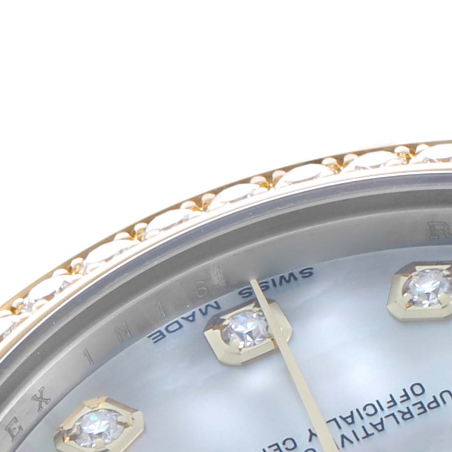 The image shows a close-up angle of the Rolex Mid-Size 178383 Women's Steel and Gold (two tone) Mother of Pearl Dial watch, focusing on the bezel, part of the dial, and diamond hour markers.