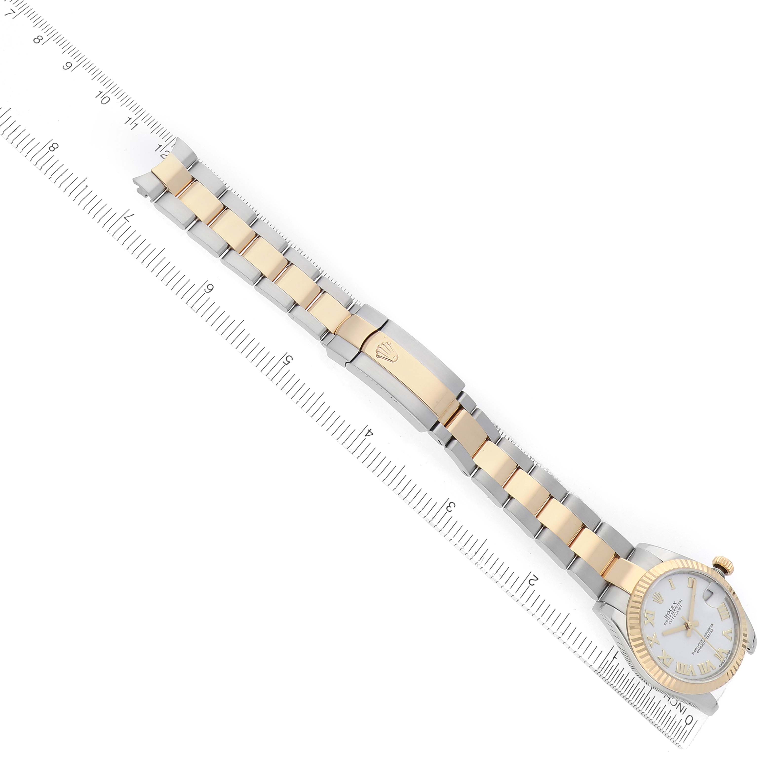 The Rolex Mid-Size 178273 Women's Steel and Gold (two tone) White Dial watch is shown at a diagonal angle, displaying the full bracelet and part of the face and bezel.