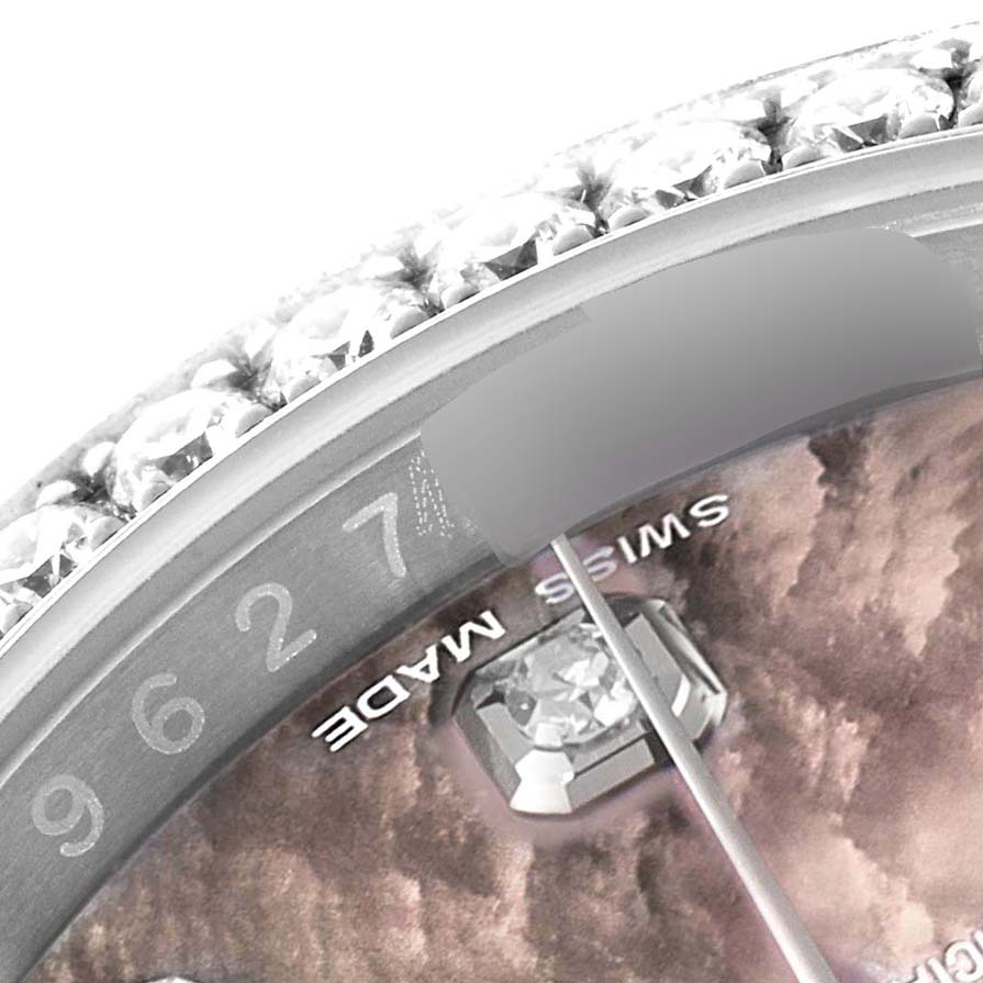 The image shows a close-up angle of the bezel and part of the dial of a Rolex Datejust 116244 Men's Stainless Steel Mother of Pearl Dial 116244 Men's Stainless Steel Mother of Pearl Dial watch.