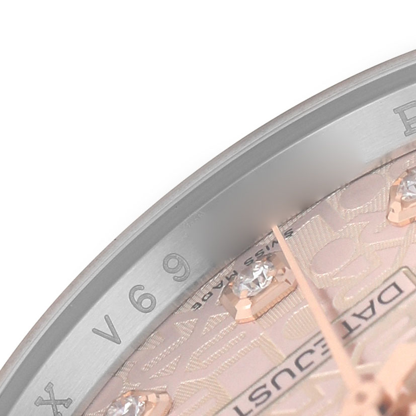 The image shows a close-up of the dial and bezel edge of a Rolex Datejust 116231 Men's Steel and Gold (two tone) Pink Dial, featuring diamond hour markers.