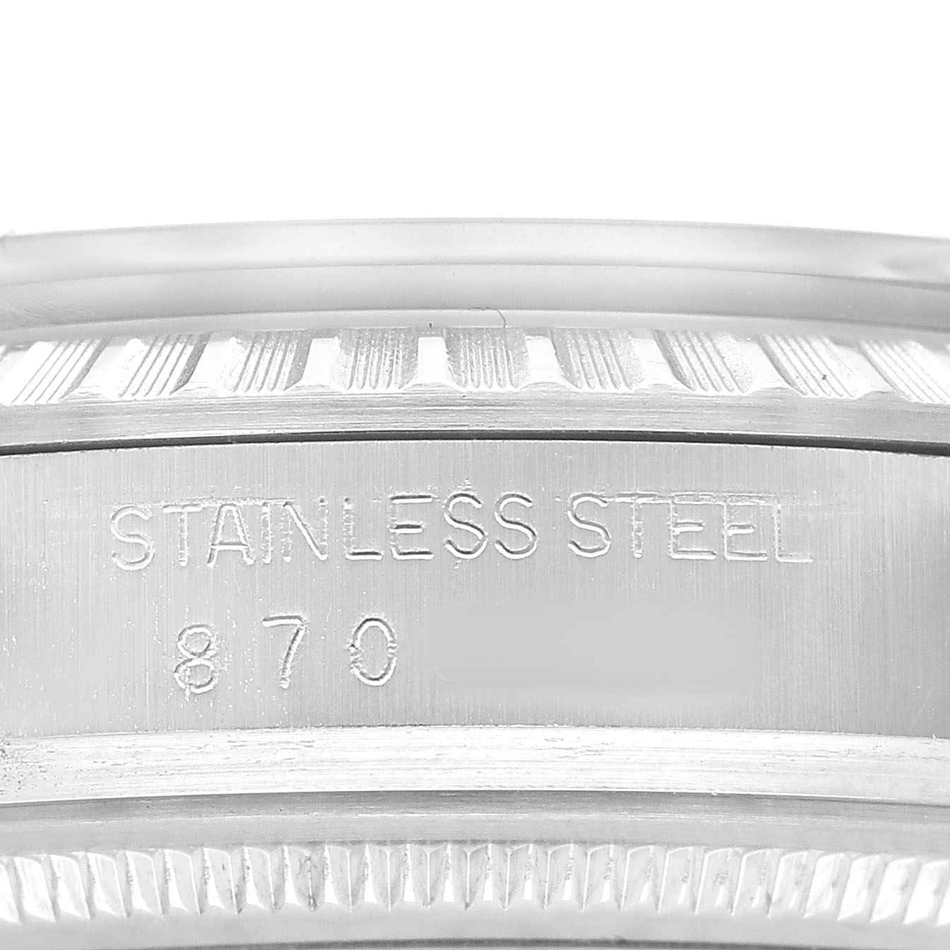 The image shows a close-up angle of the side of a Rolex Datejust 16030 Men's Stainless Steel Silver Dial watch with "Stainless Steel" inscribed.