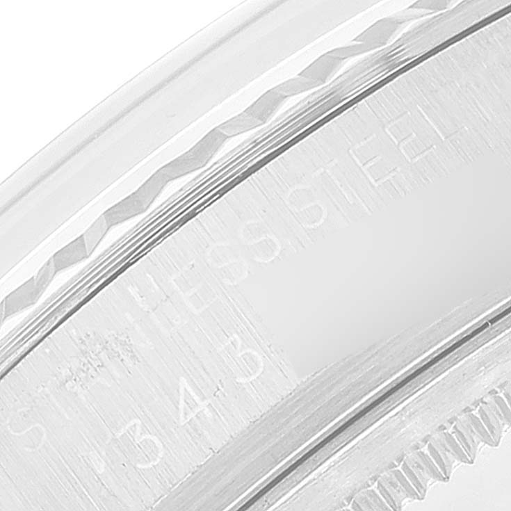 This image shows a close-up of the stainless steel bezel and case side of the Vintage Collection model by Rolex.