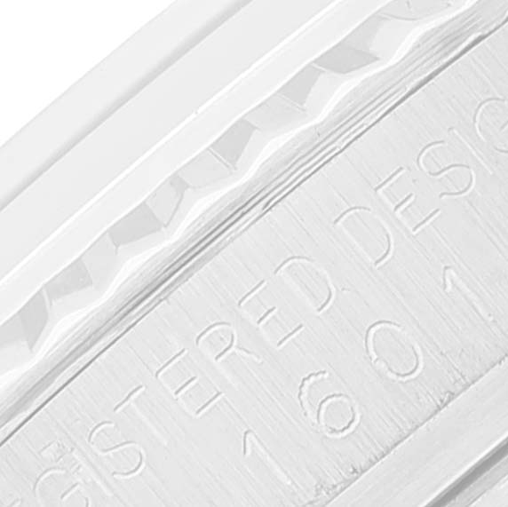 This image shows the engraved side of the Rolex Vintage Collection 1601 Men
s Stainless Steel Silver Dial 1601 Men
s Stainless Steel Silver Dial watch case.