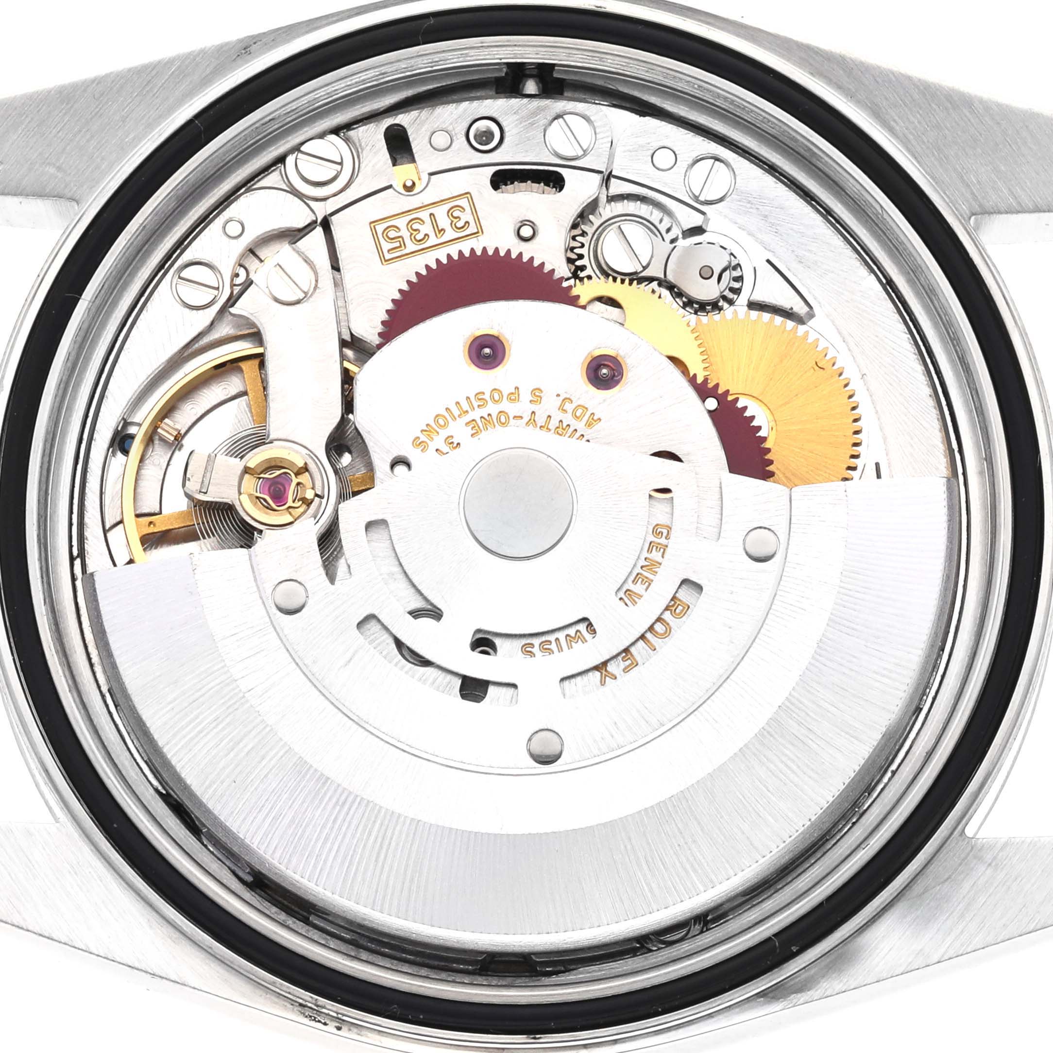 The image shows the movement of a Rolex Datejust 16234 Men
s Stainless Steel Silver Dial 16234 Men
s Stainless Steel Silver Dial watch from the back, highlighting its intricate mechanisms.