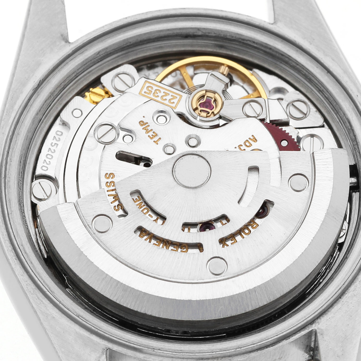 The image shows the internal movement of a Rolex Datejust 79174 Women's Stainless Steel Silver Dial, viewed from the back with gears and components visible.