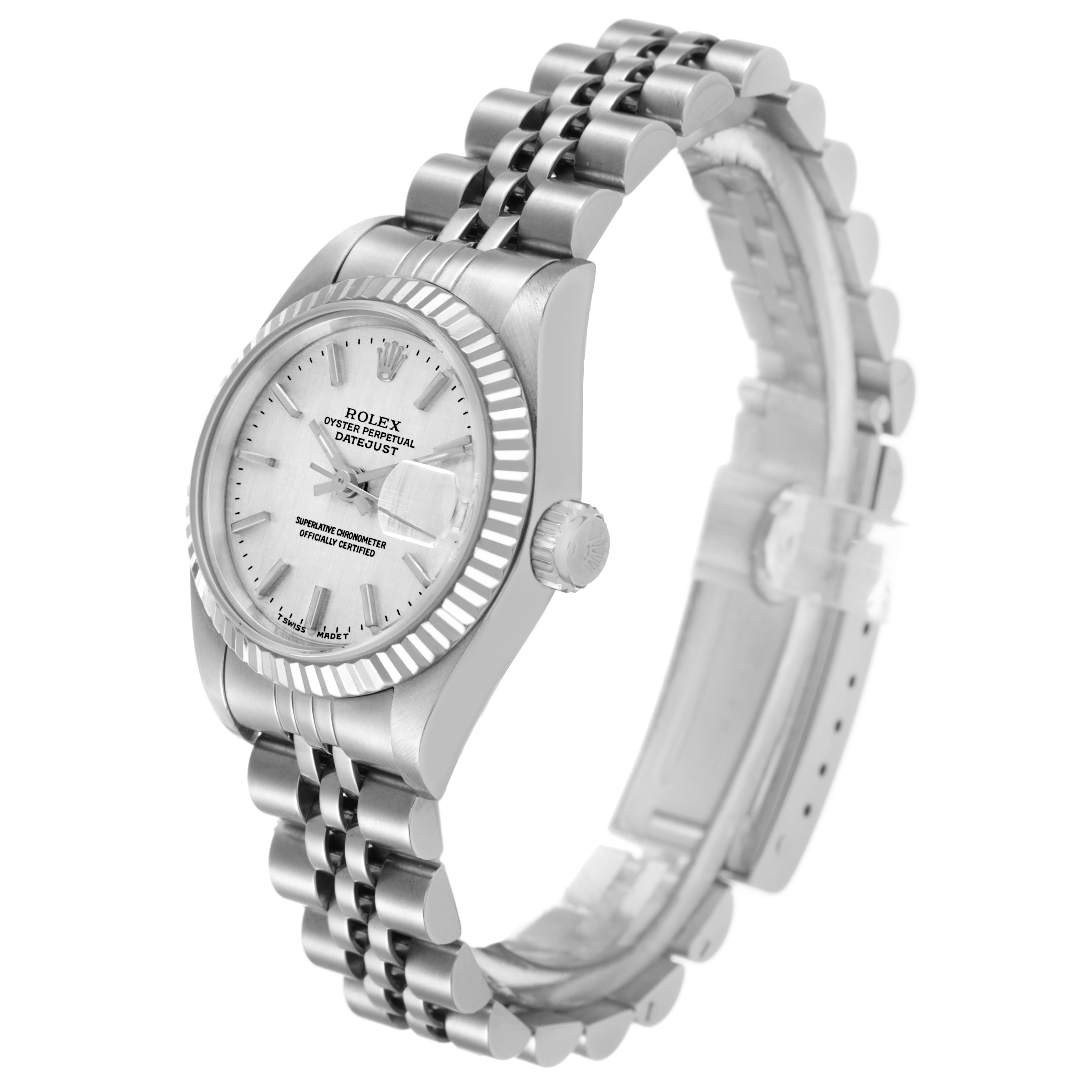 The Rolex Datejust 79174 Women's Stainless Steel Silver Dial watch is shown at a three-quarter angle, displaying the dial, fluted bezel, crown, and Jubilee bracelet.