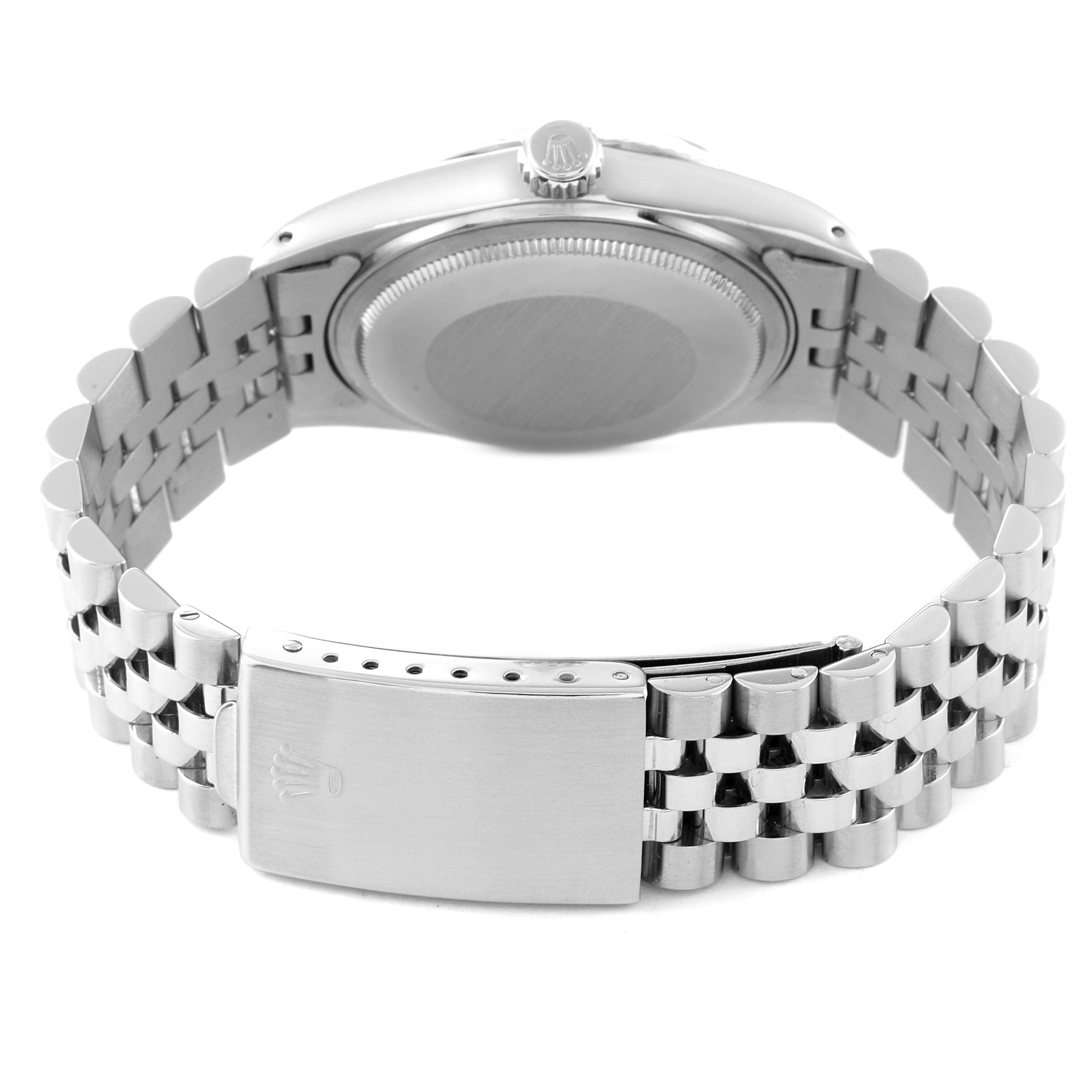 This image shows the back view of a Rolex Vintage Collection 16014 Men
s Stainless Steel Silver Dial 16014 Men
s Stainless Steel Silver Dial watch, highlighting the case back, crown, and bracelet with a clasp.