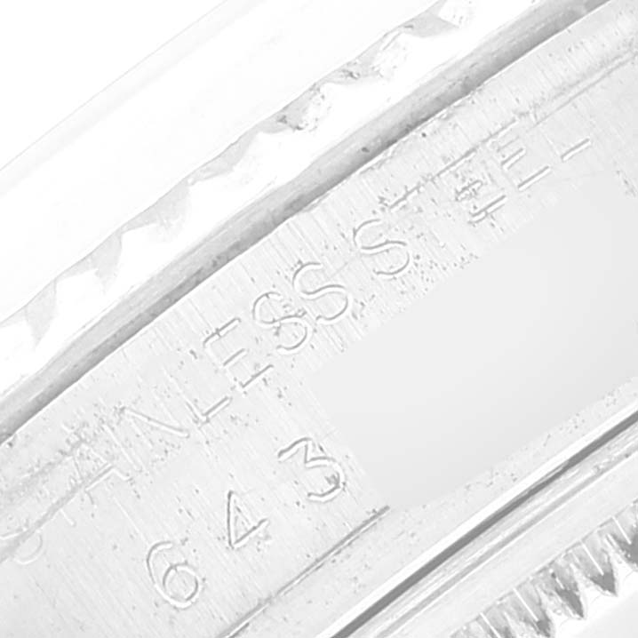 This close-up shows the engraved stainless steel portion of the Rolex Vintage Collection 16014 Men
s Stainless Steel Silver Dial 16014 Men
s Stainless Steel Silver Dial watch.