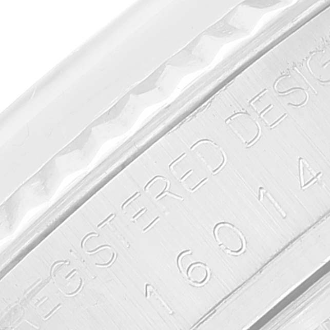 The image shows a close-up of the side engraving on a Vintage Collection model by Rolex.