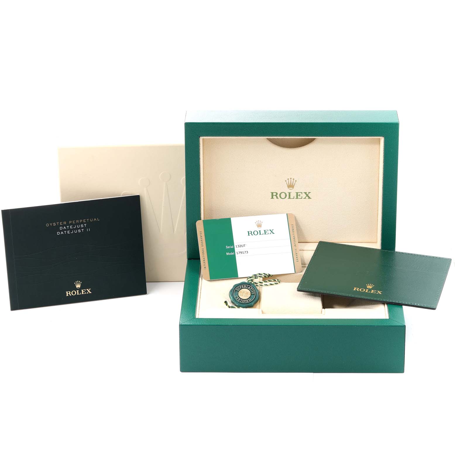 The image shows the packaging and accessories of a Rolex Datejust 179173 Women's Steel and Gold (two tone) Black Dial 179173 Women's Steel and Gold (two tone) Black Dial, including a presentation box, booklet, card, and tag.